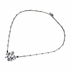 Cartier Collier pendentif Melimero en or blanc 18 carats