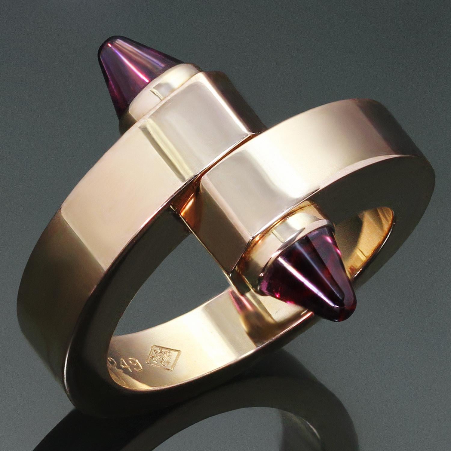 This gorgeous Cartier ring from the chic Menotte collection features a crossover design crafted in 18k rose gold and completed with bullet-cut cabochon amethyst tips. Made in France circa 2000s.  Measurements: 0.74