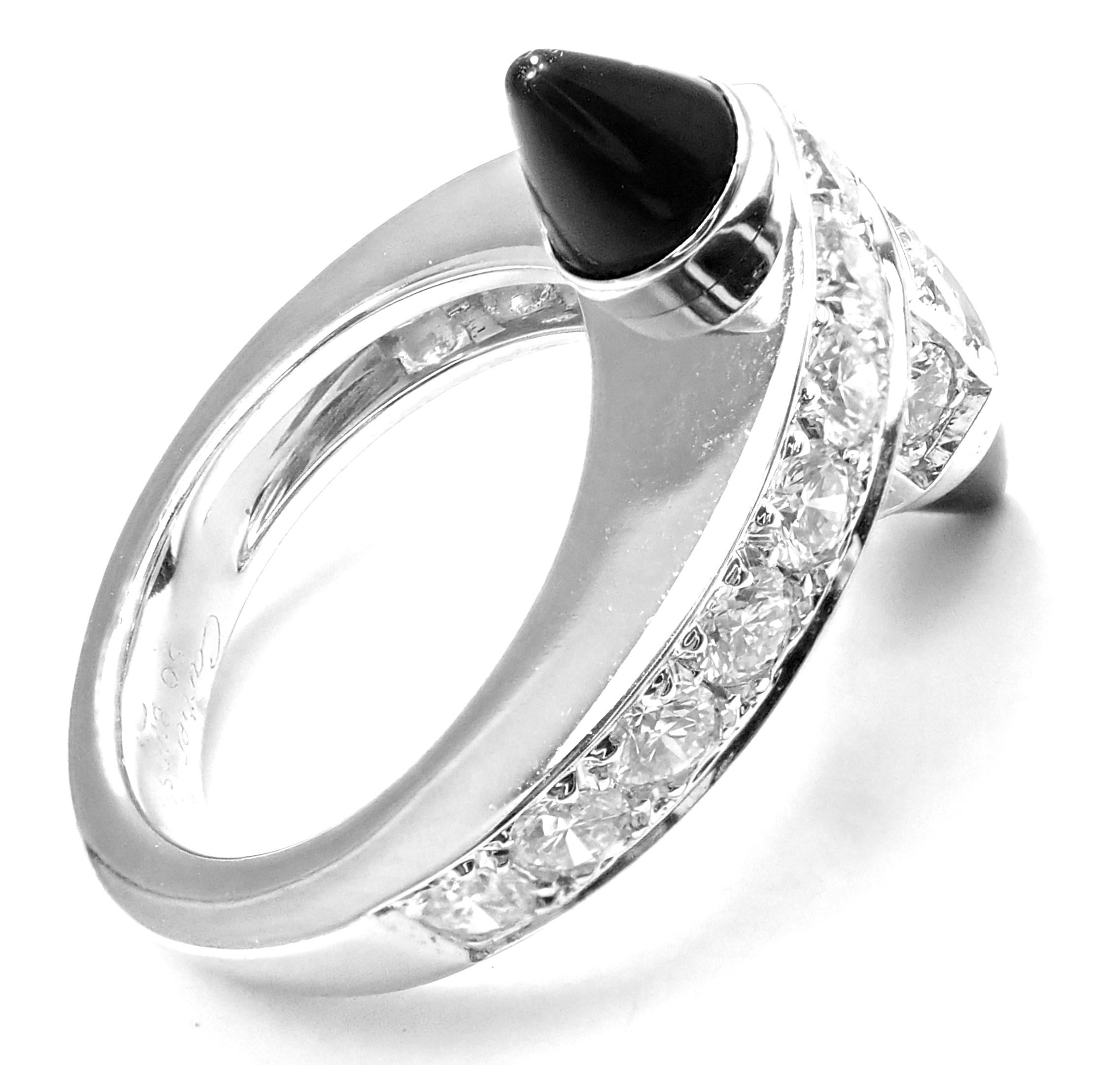 18k White Gold Diamond and Black Onyx Menotte Ring by Cartier.  
With 20 round brilliant cut diamonds VVS1 clarity, G color total weight approx. 1.5ct
2 Black Onyx Stones  
Details:  
Ring Size: European 50 US 5 1/4
Weight: 10.4 grams
Width: