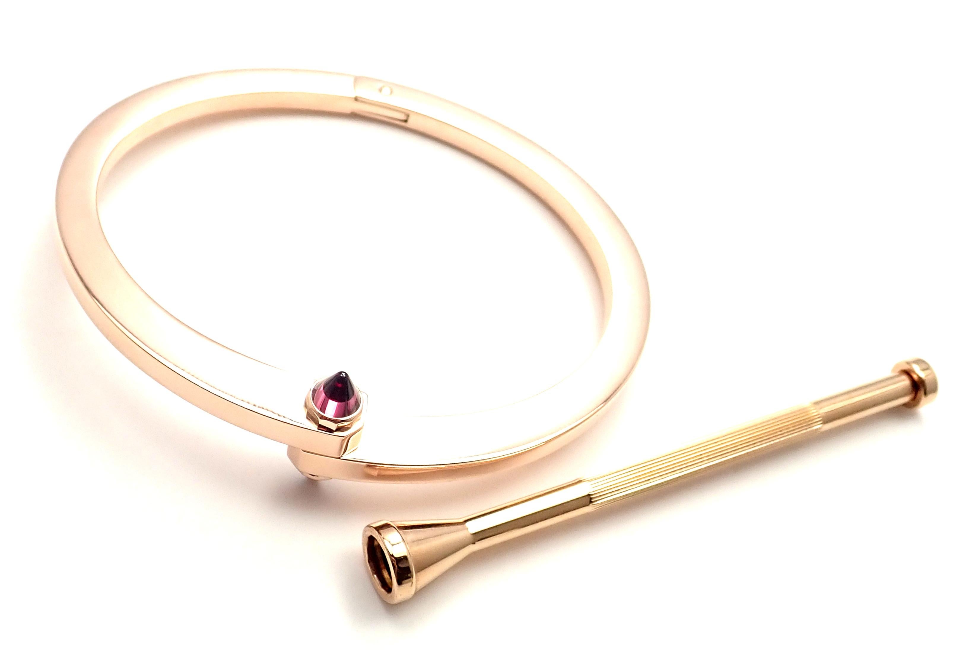 Bracelet Cartier Menotte en or rose et grenat 6