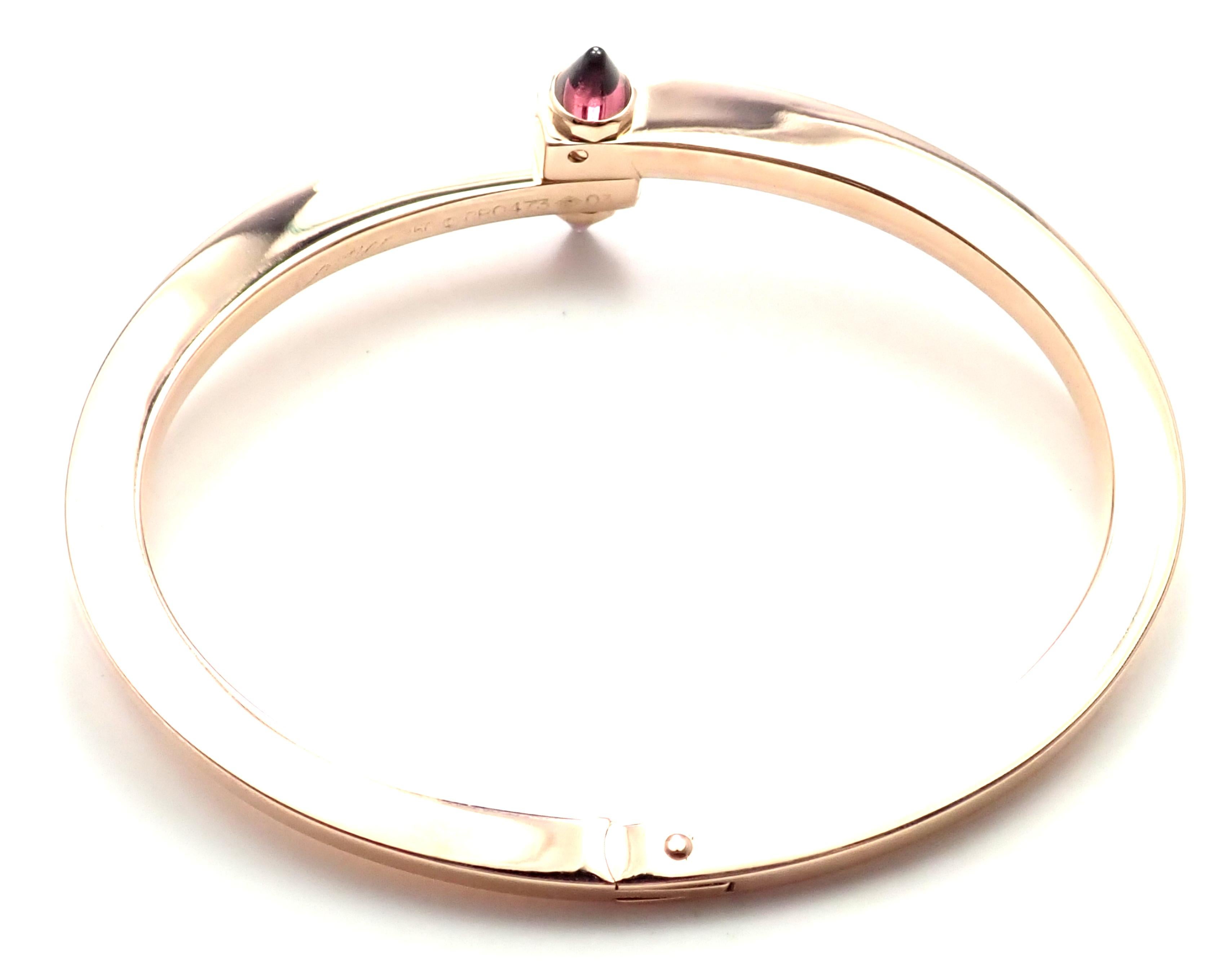 Bracelet Cartier Menotte en or rose et grenat 3
