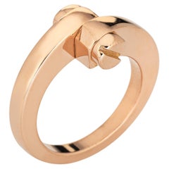 Cartier Menotte Ring 18k Roségold Band US 7 1/2 Schraubenmotiv Bypass