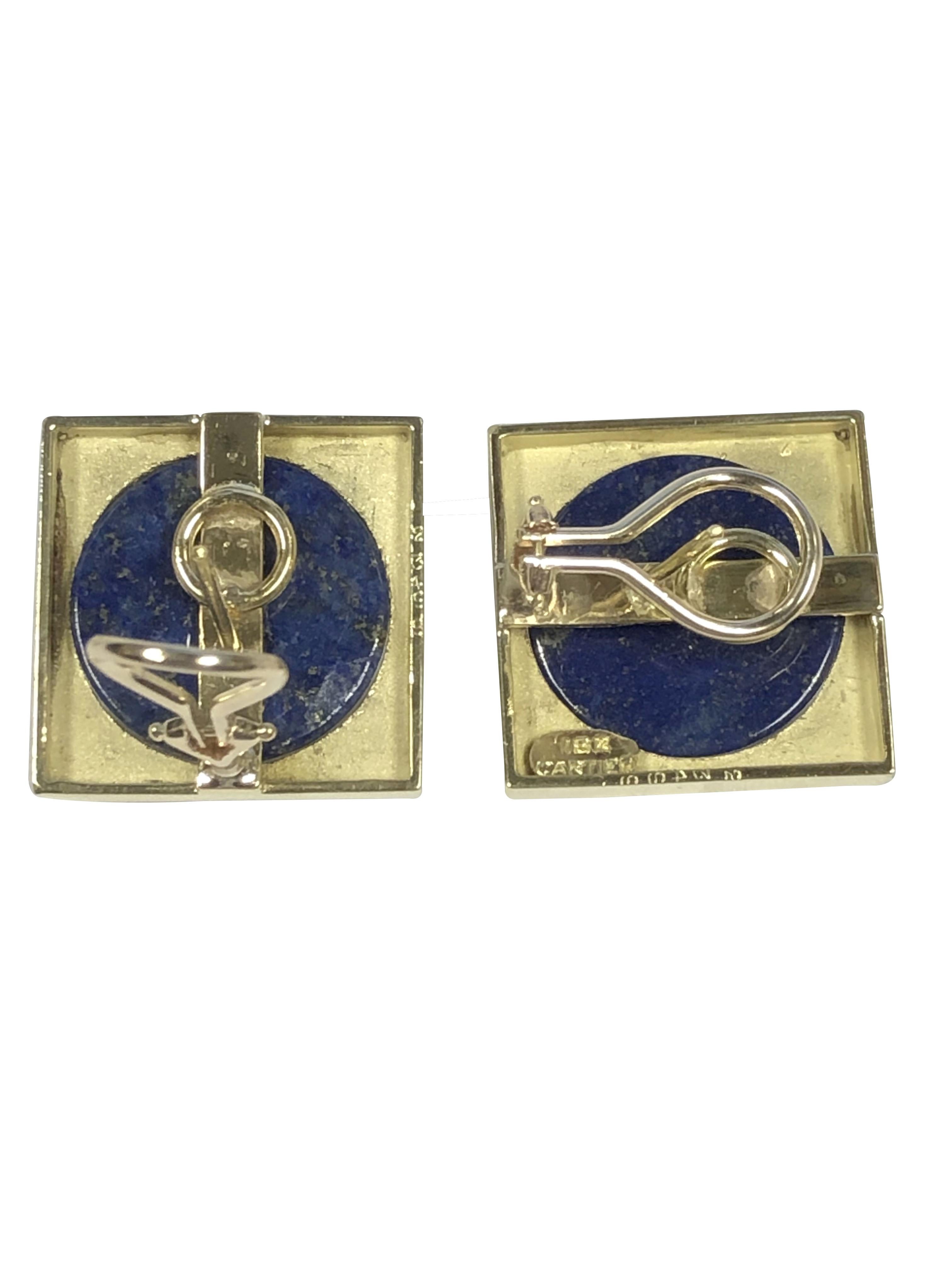 Circa 1960s Cartier 18k Yellow Gold Earrings, measuring 7/8 x 7/8 inch and centrally set with a domed Cabochon Lapis Lazuli, nice solid construction with a weight of 20.9 Grams. One earring has a signature and both have Cartier control numbers.