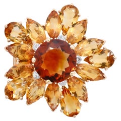 Broche Girasol Cartier Mediados de Siglo Granate Spessartine, Topacio Imperial y Diamante