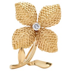Cartier Mid-century yellow gold diamond flower brooch 