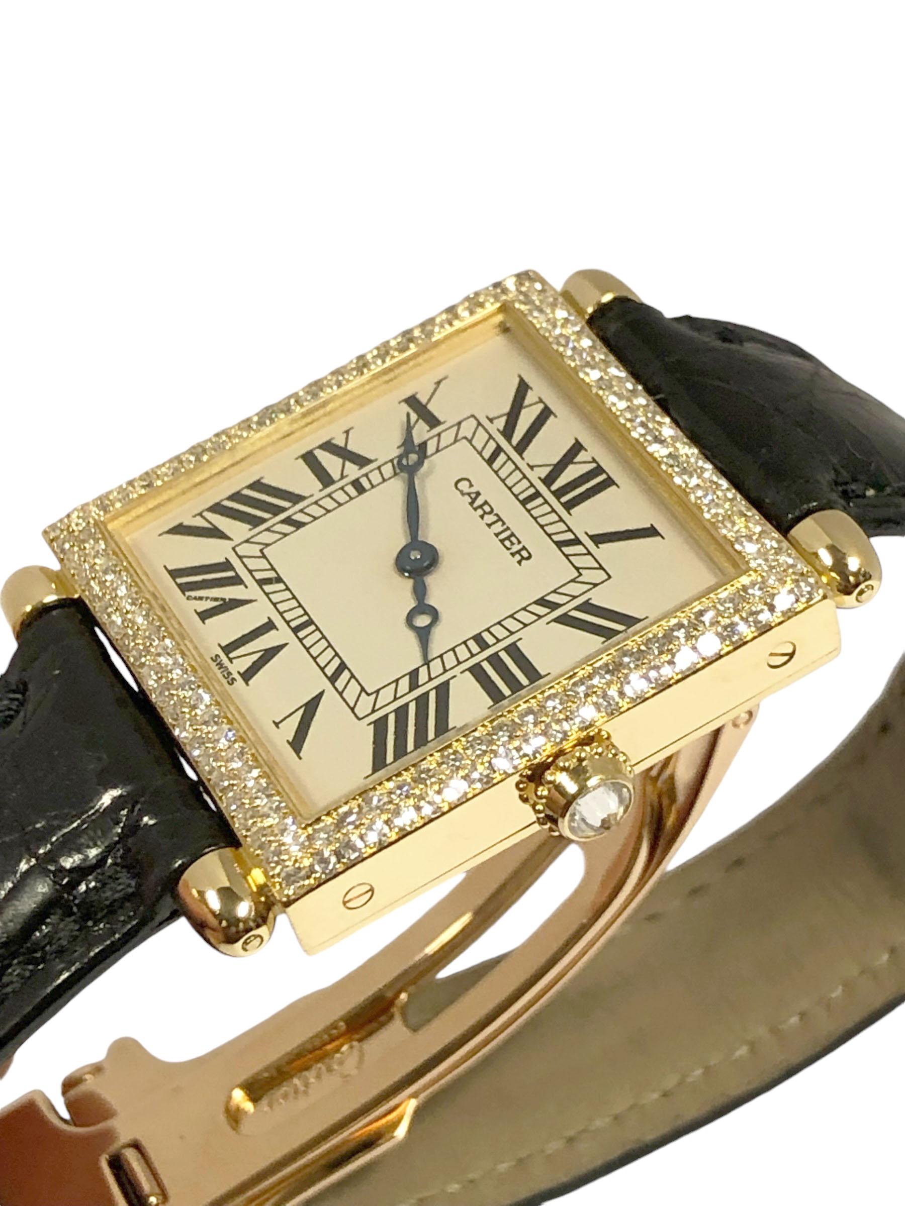 Circa 2000 Cartier Tank Obus Reference 1630 Wrist Watch, 18K Yellow Gold 30  X  25 MM water resistant 2 piece case with 2 rows of Factory set Diamonds totaling approximately 2 carats,  Diamond set crown, mineral Glass crystal, Quartz Movement,