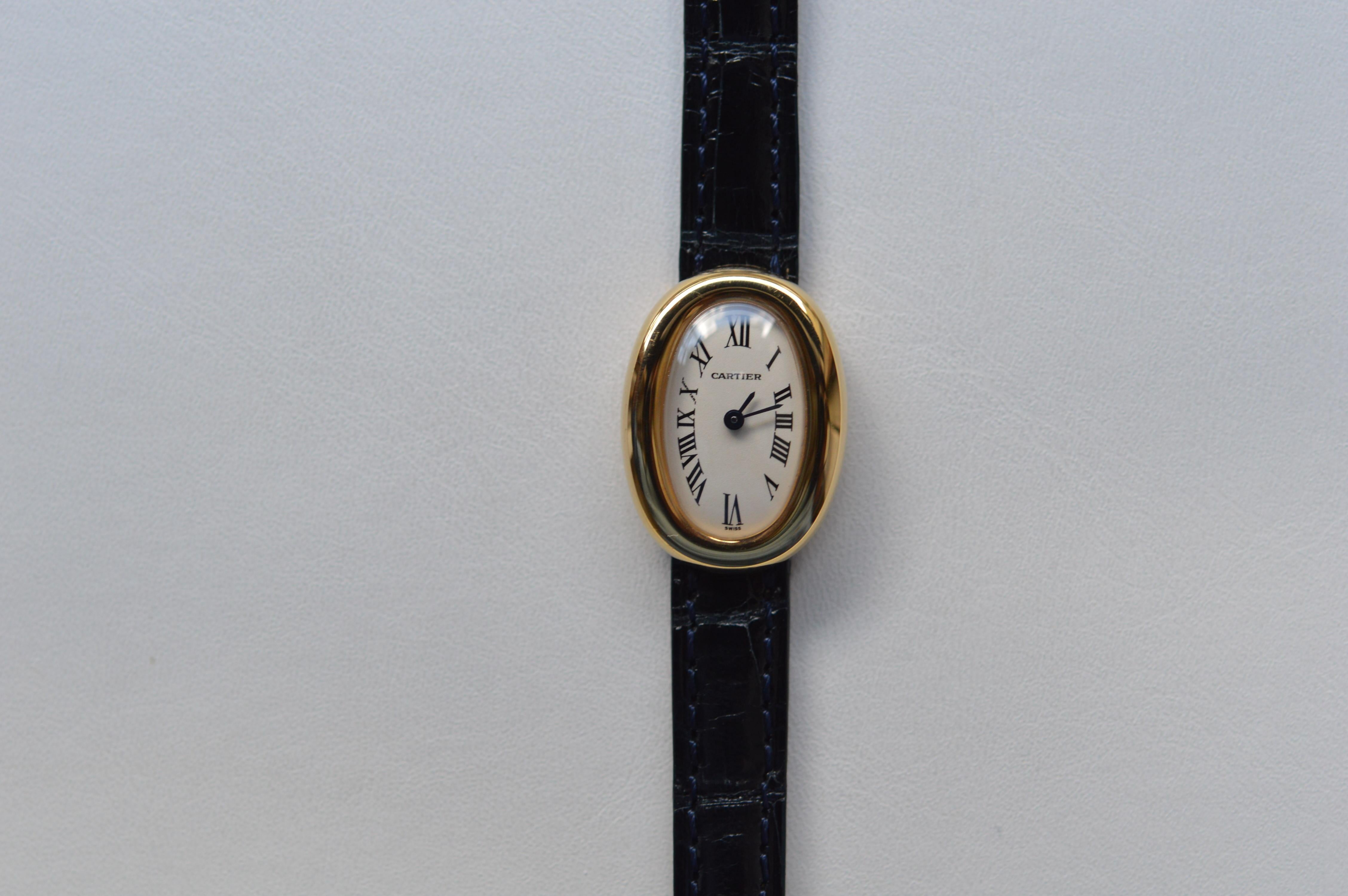 Cartier Mini Baingoire 18K Yellow Gold
Reference n° W1510956
24mm X 18mm Size
18K Yellow Gold Case
Cream/White Dial
Blue Leather Strap
Blued Steel Sword Shaped Hands
Water Resistant 3ATM - 30M - 100 FT
Quartz Movement
New Old Stock Condition
Brand