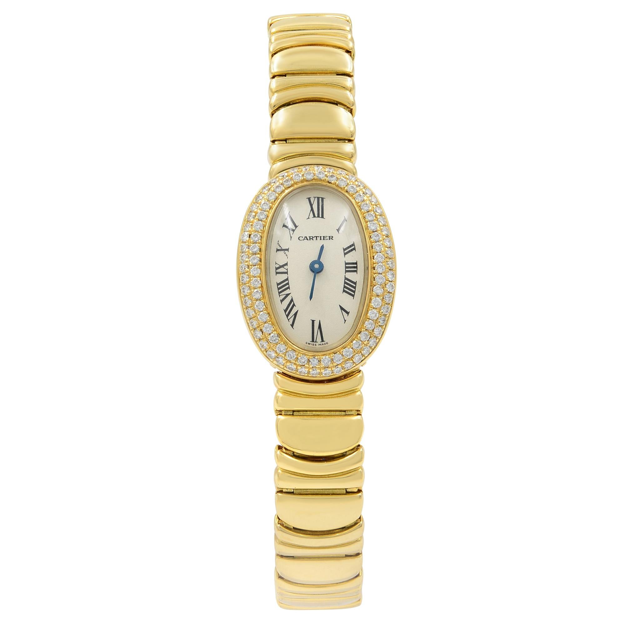 This pre-owned Cartier Baignore  WB5094WI is a beautiful Ladies timepiece that is powered by a quartz movement which is cased in a yellow gold case. It has an oval shape face, diamonds dial, and has hand roman numerals style markers. It is completed