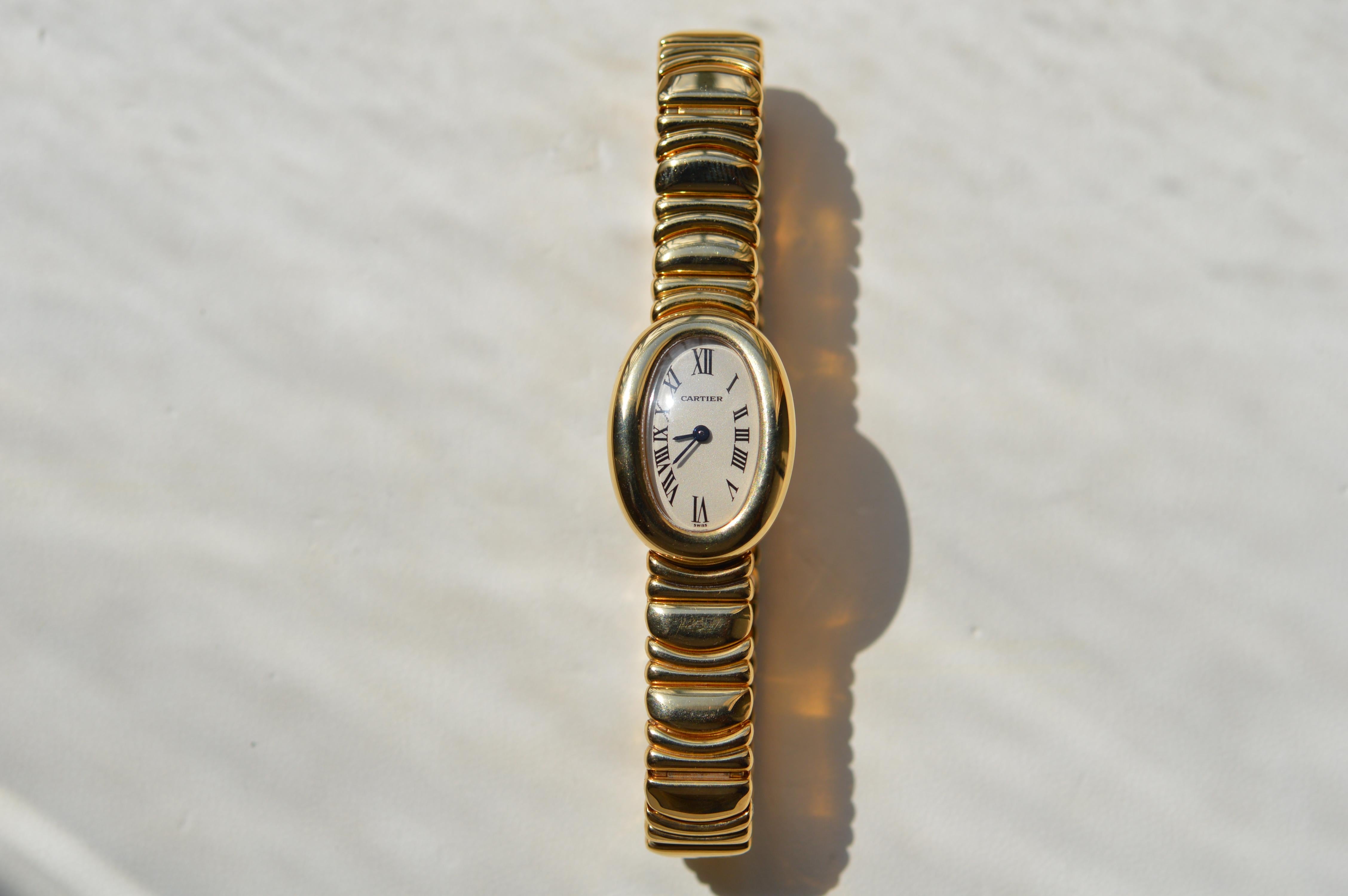 Cartier Mini Baignoire 18K Yellow Gold
Reference n° W15109D8
25mm X 17mm
18K Yellow Gold Case and Bracelet
Cream/White Dial
Blued Steel Sword Shaped Hands
Quartz Movement
Water Resistant 3ATM - 30M - 100 FT
New Old Stock Condition
Brand new never