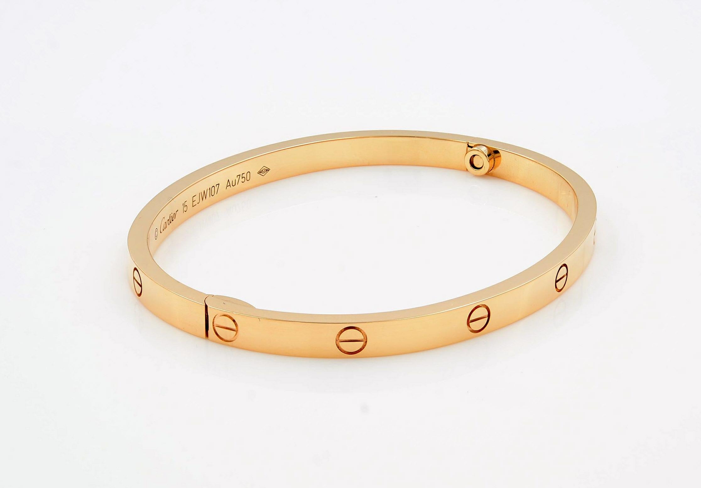 Cartier Rose Gold Small Model Love Size 15 Bracelet with signature screw motif throughout and a high polish finish

Metal Type: 18K Rose Gold
Hallmark: 750, Serial Number 
Metal Finish: High Polish
Collection: Love
Condition: Very good. 

Dear