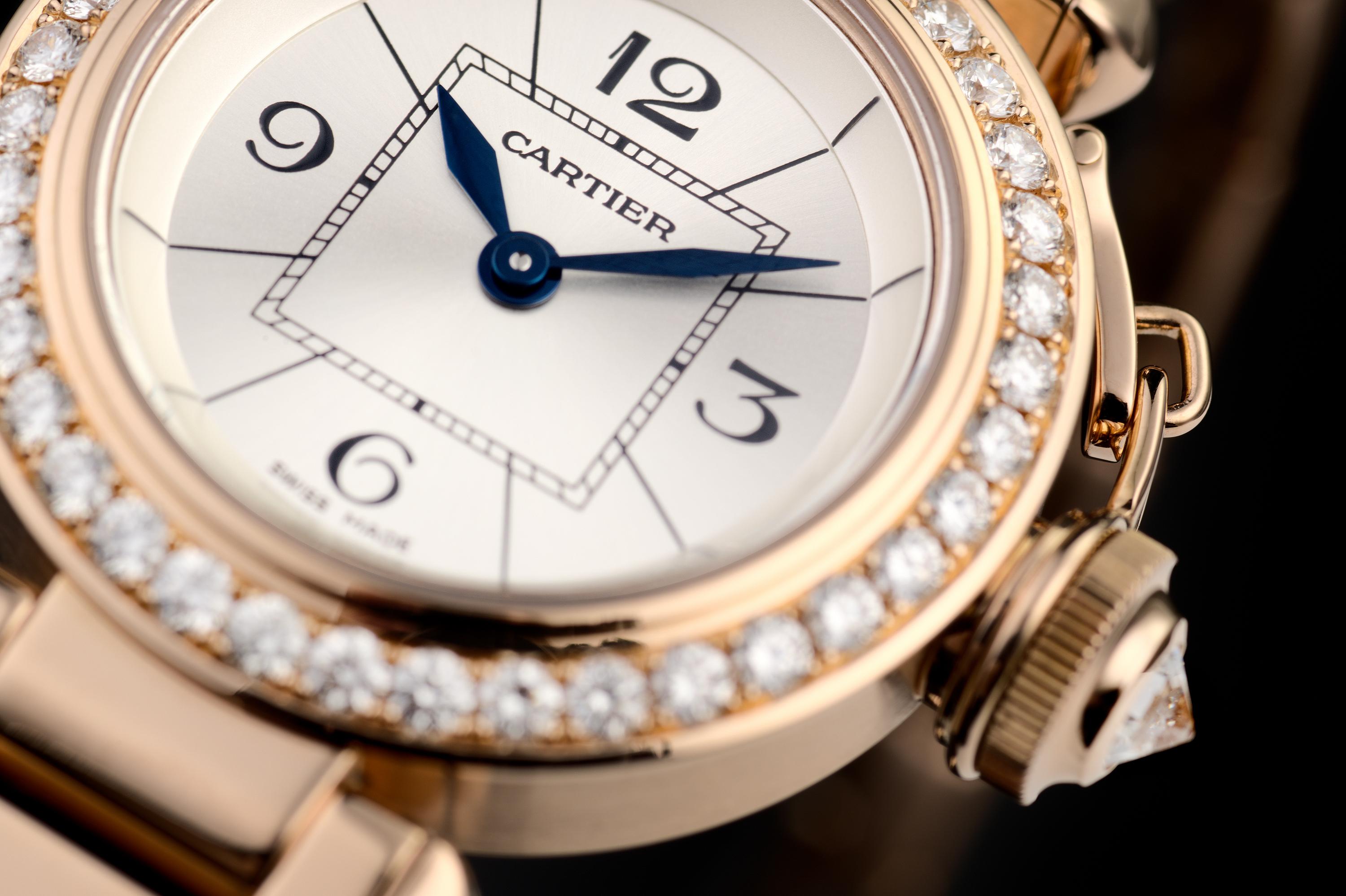 Originally designed for the Pasha of Marrakech, this is the Pasha de Cartier. This 27mm 'mini' with a diamond set bezel is in superb condition, and is fitted to a solid 18ct rose gold bracelet. Featuring a silver quarter Arabic dial with blued steel