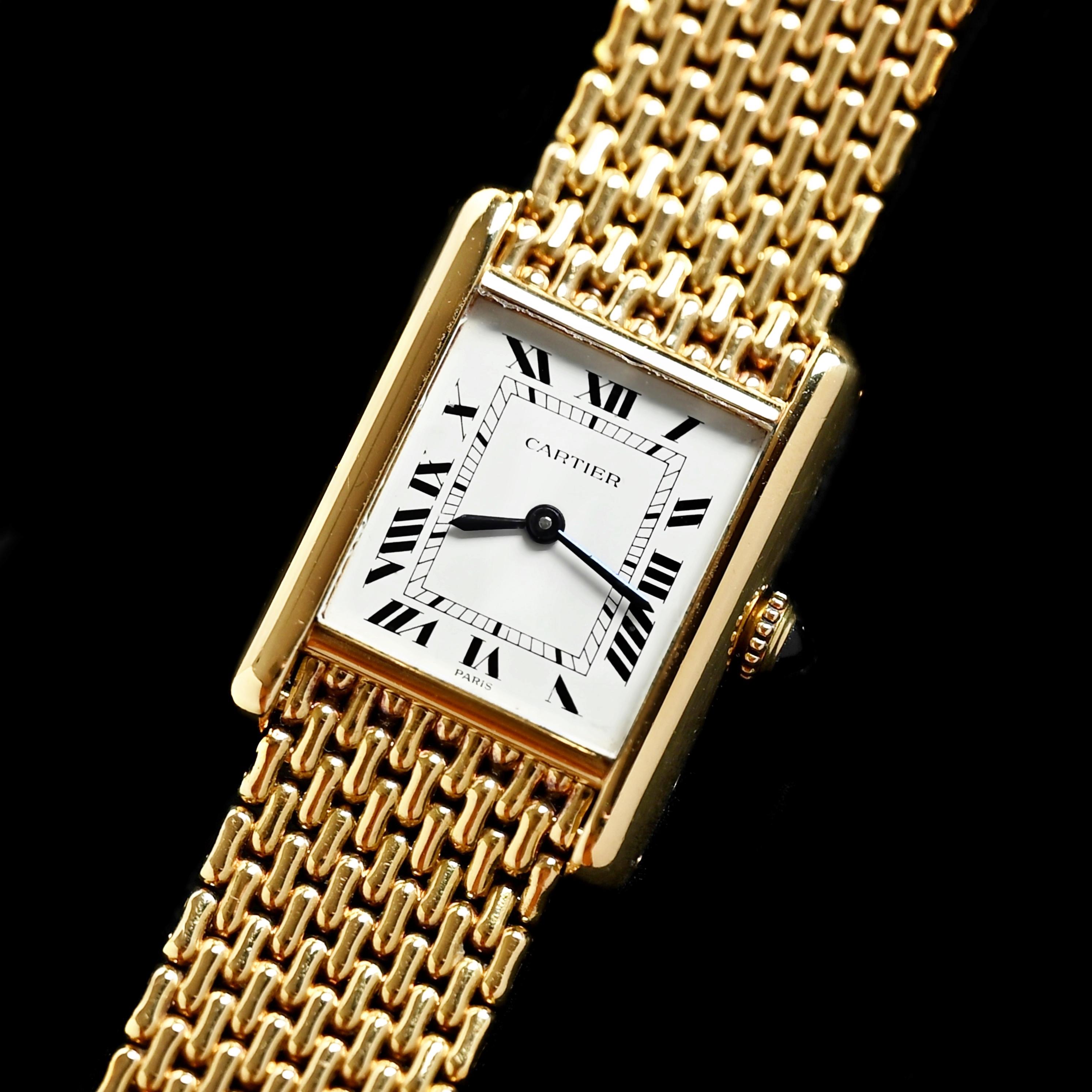 Cartier Mini Tank Louis 18K YG Paris Zifferblatt Ref. 78087 Handaufzug mit integriertem Gliederarmband
Marke: Cartier
Modell: Mini Tank Louis
Jahr: 1970er Jahre
Seriennummer: 78087xxxx

Referenz: C04378

Die Cartier Tank hat sich als legendäre Uhr