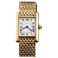 Cartier Mini-Tank Louis 18K YG Paris Zifferblatt 78087 Handaufzug mit Armband, 1970er Jahre