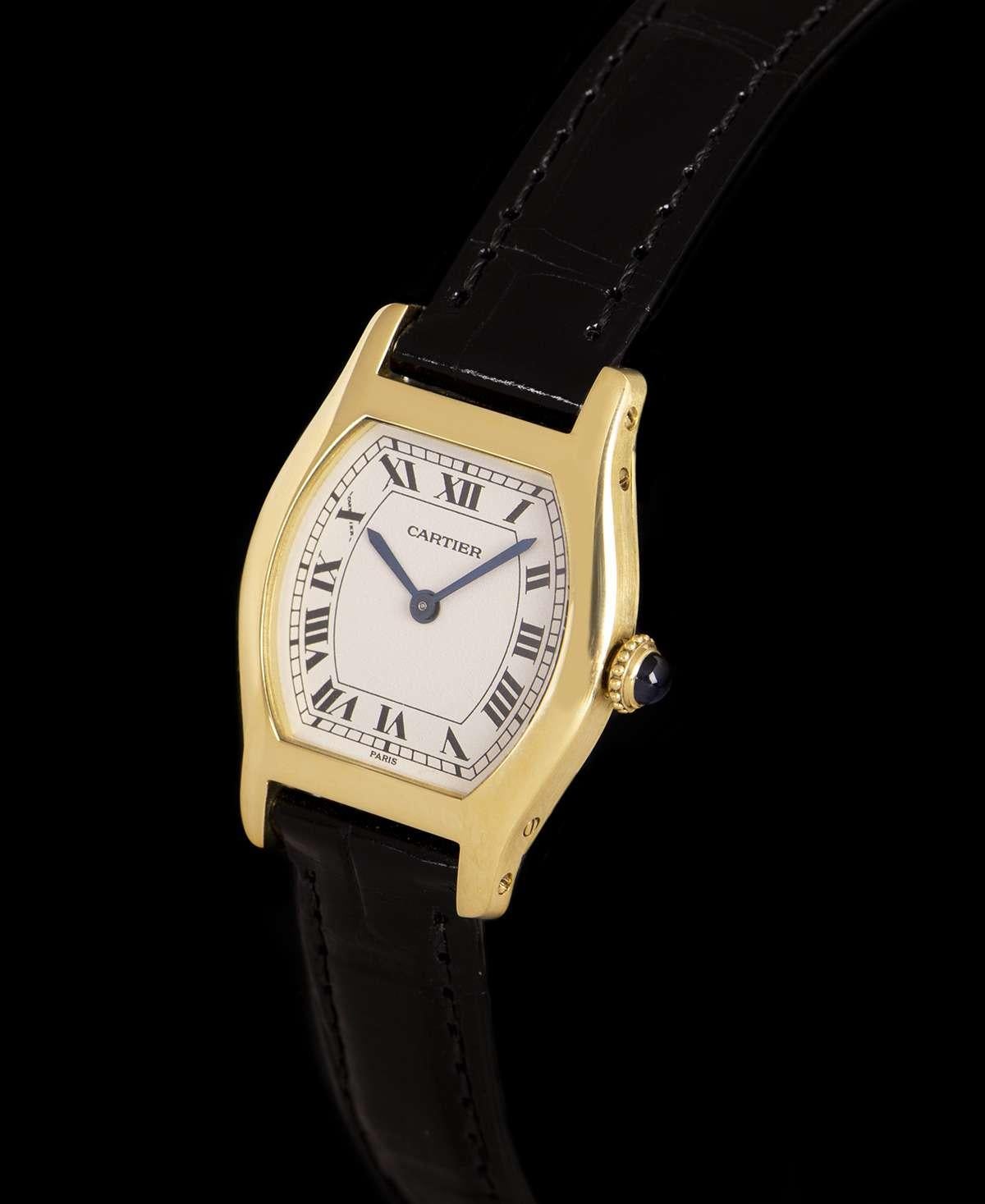 An 18k Yellow Gold Mini Tortue Ladies Wristwatch, silver dial with roman numerals and a secret signature at 
