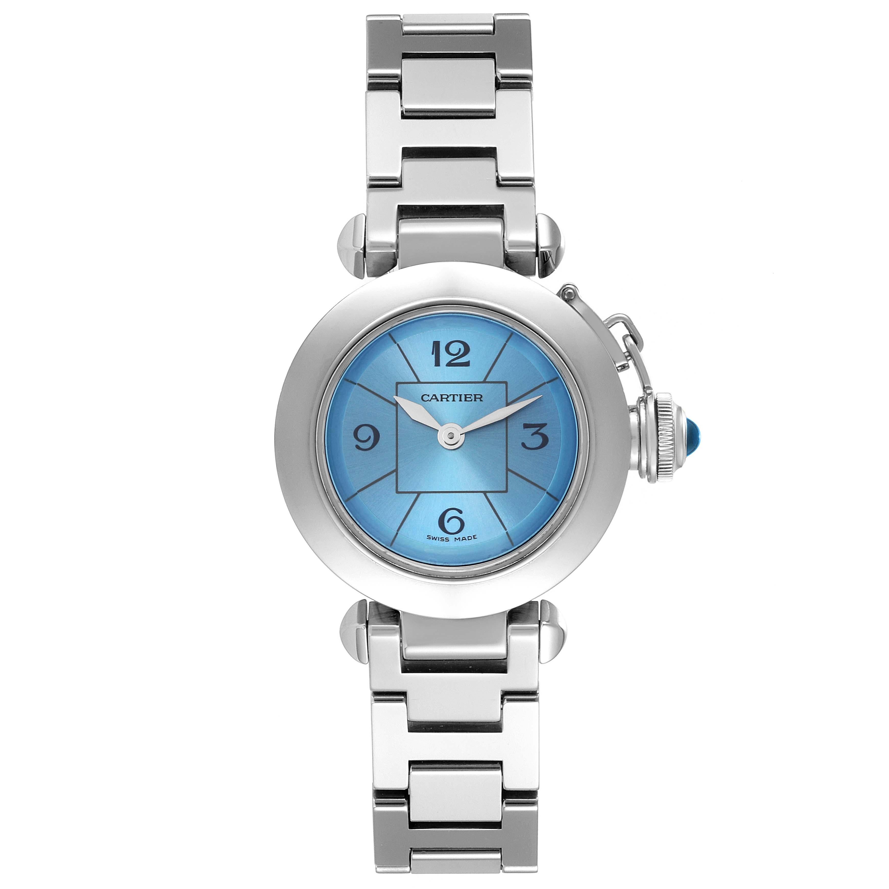 Cartier Miss Pasha 1st Anniversary Blue Dial Steel Ladies Watch W3140024. Quartz movement. Round polished and brushed stainless steel case 27.0 mm in diameter. Vendome lugs. Winding-crown protection cap set with a blue faceted cabochon. Concave