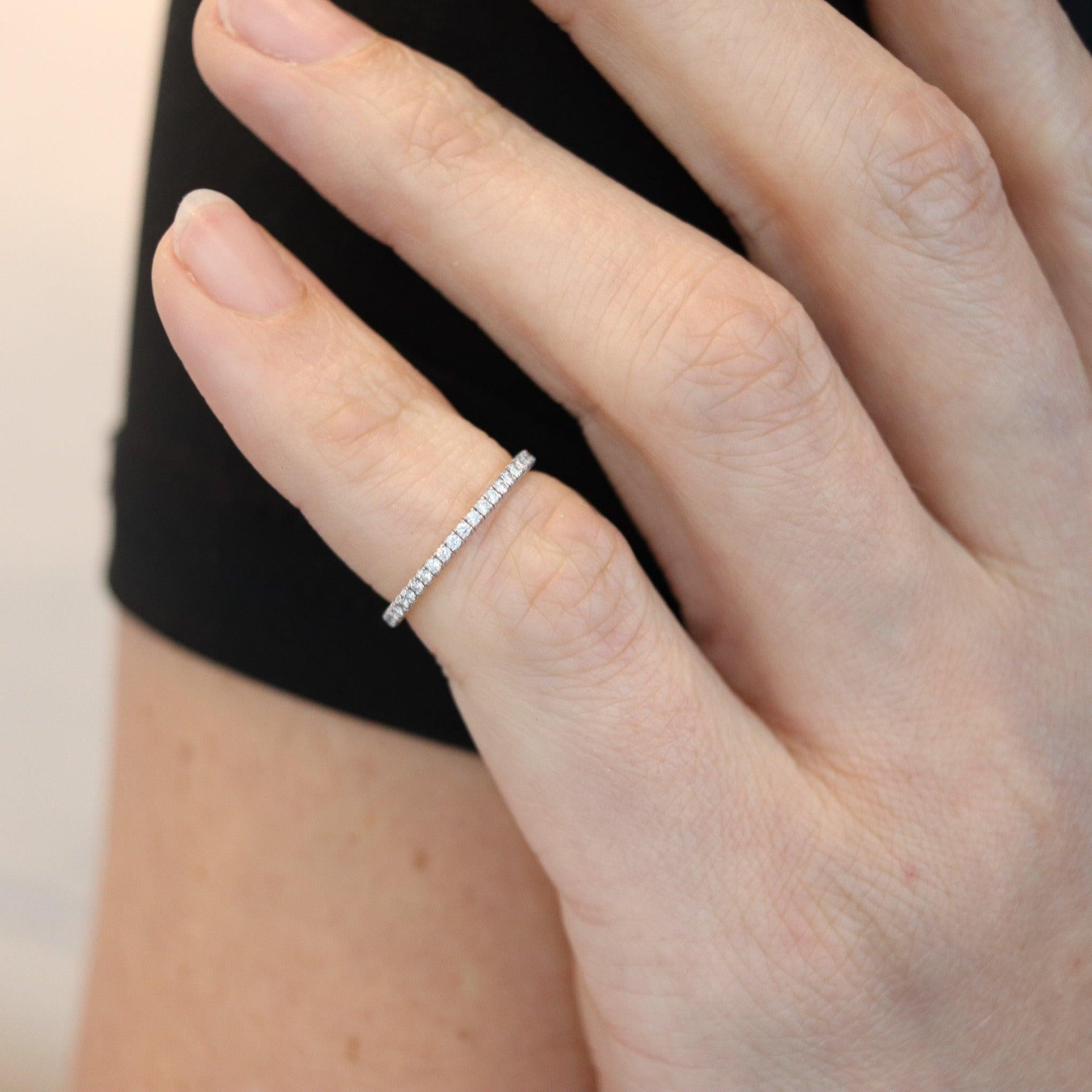 An eternity ring designed by Cartier.

Gorgeous modern eternity ring, created in Paris France by the jewelry house of Cartier. The diamond's ring is a classic and has been crafted in solid white gold of 18 karats with high polished finish and