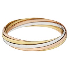 Cartier Modernistischer dreifarbiger, sechsstrangiger, Rolling Armreif aus Gold