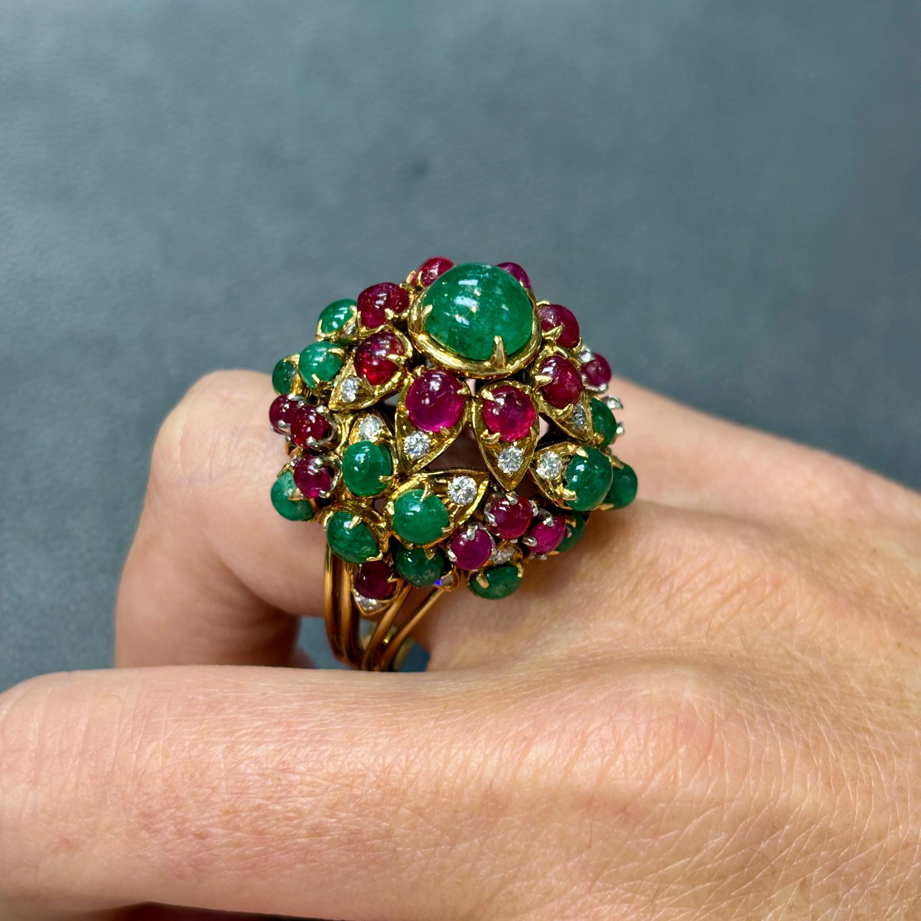  Cartier Mughal Style Ruby & Emerald Cocktail Dome Ring.

A dome ring featuring a center cabochon emerald surrounded by small cabochon rubies, emeralds & round cut diamonds.

Circa 1950.

Ring Size: 8.75

Signed and numbered

Complimentary resizing