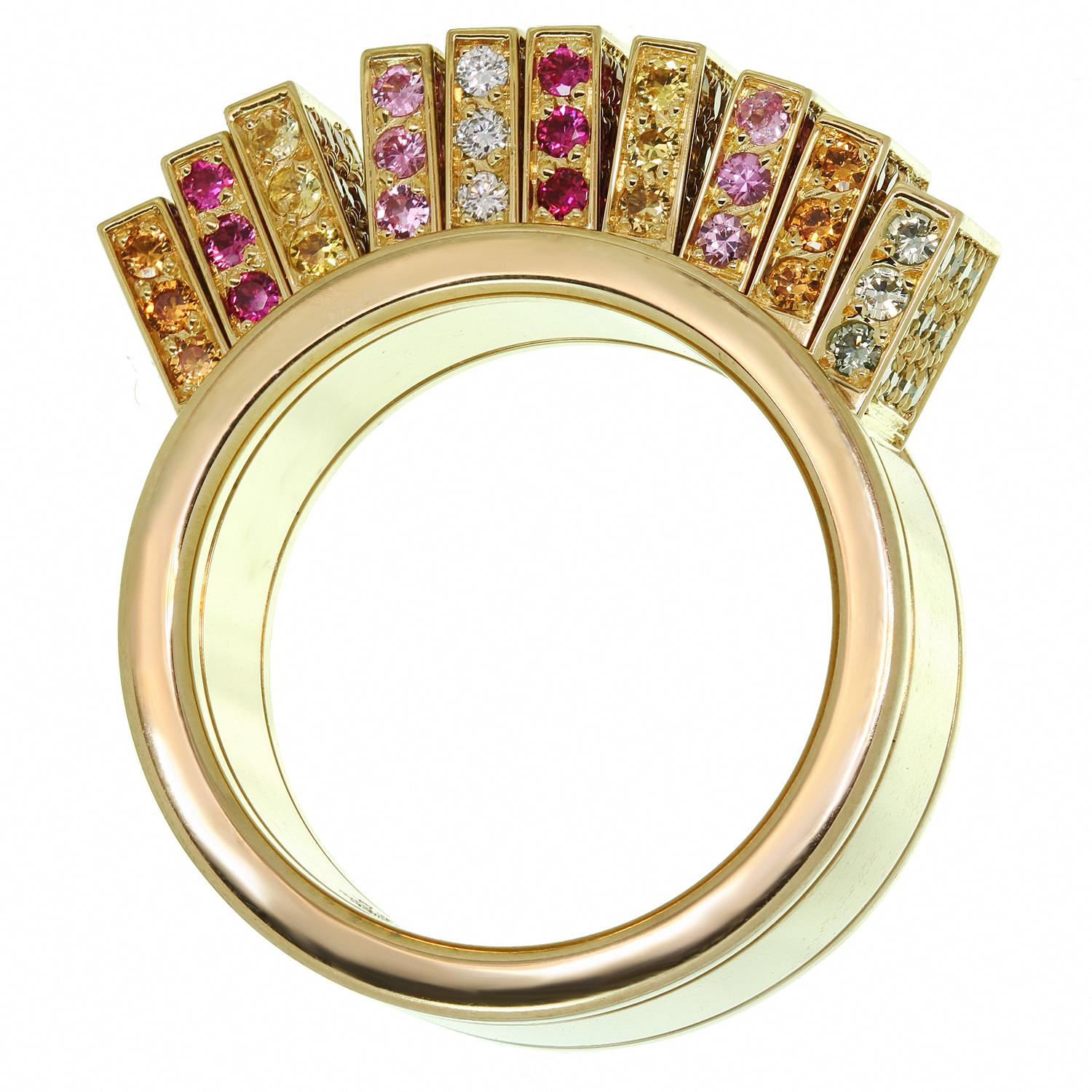 This gorgeous Cartier fan ring is crafted in 18k yellow gold and featuring movable panels set with round brilliant-cut diamonds and multi-color sapphires. Made in France circa 2010s. Measurements: 0.43