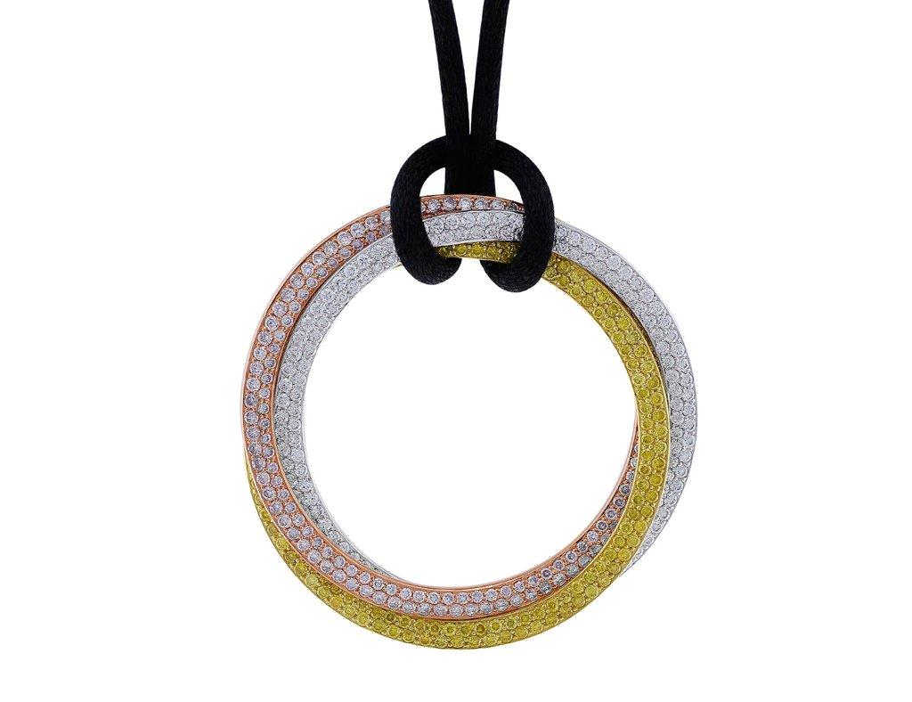 Estate Cartier Multicolored Diamond Trinity Necklace. This colorful estate Cartier Trinity necklace is an 18k rose, white and yellow gold pendant pave set with matching diamonds on a black cord. The total diamond weight is 3.82cttw, with the white