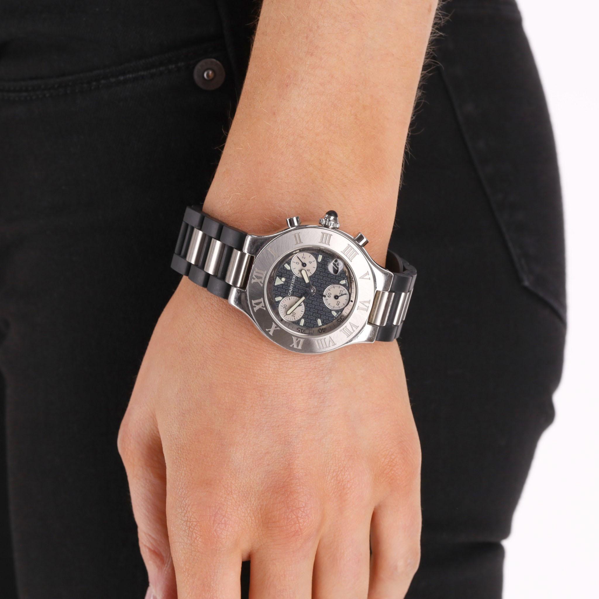 Cartier Must 21 Chronoscaph Stainless Steel Watch

Stainless steel case with roman numerals and black baton dial with iconic Cartier logo pattern.

Featuring a date indicator at 4 o’clock and quartz movement with chronograph function.

Set on a