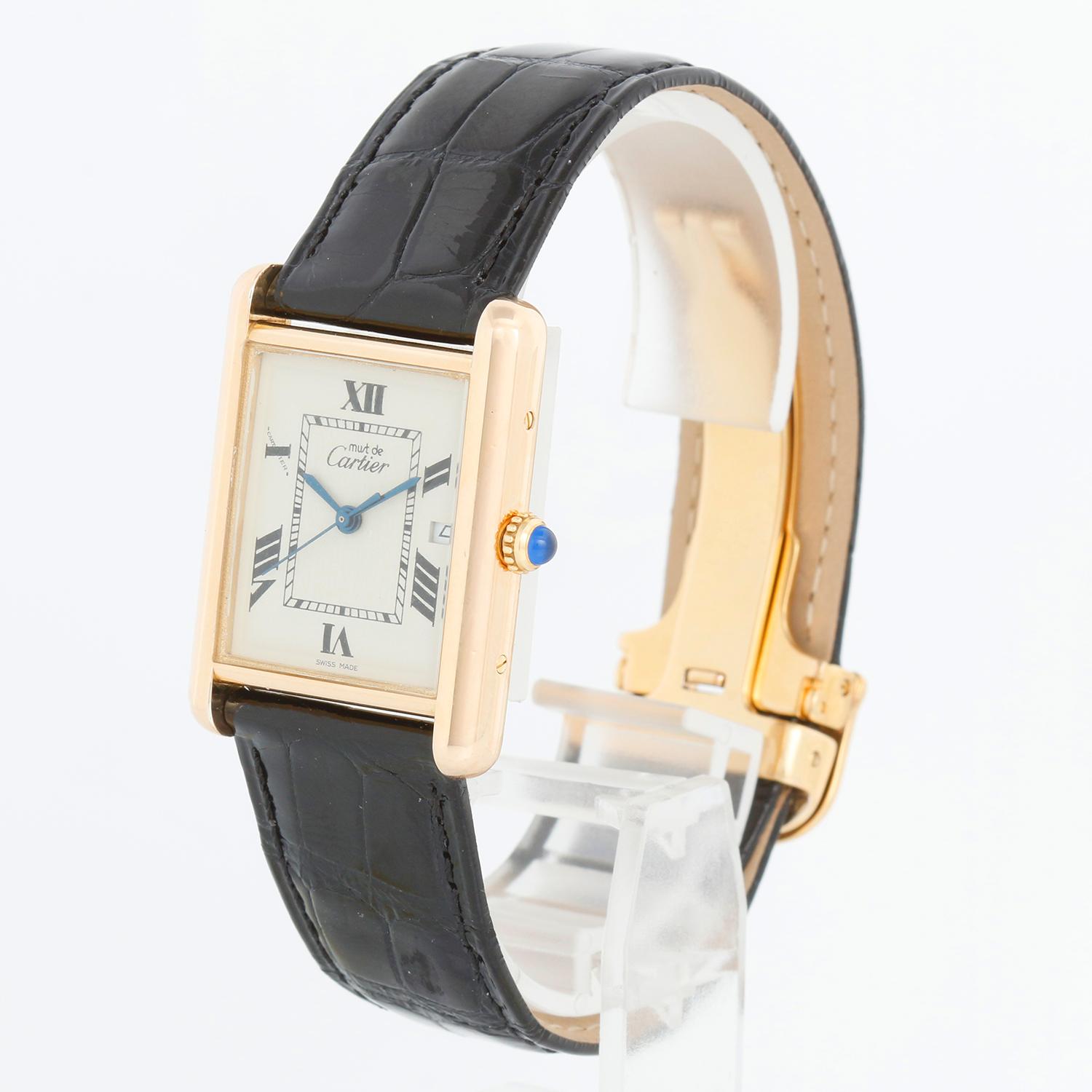 Cartier Must de Cartier Argent Quartz Watch Ref. 2413 - Quartz. Silver case ( 20 x 28 mm). White Dial with Roman numerals. New Black Cartier strap band with Cartier deployant buckle. Pre-owned with Cartier box and book.