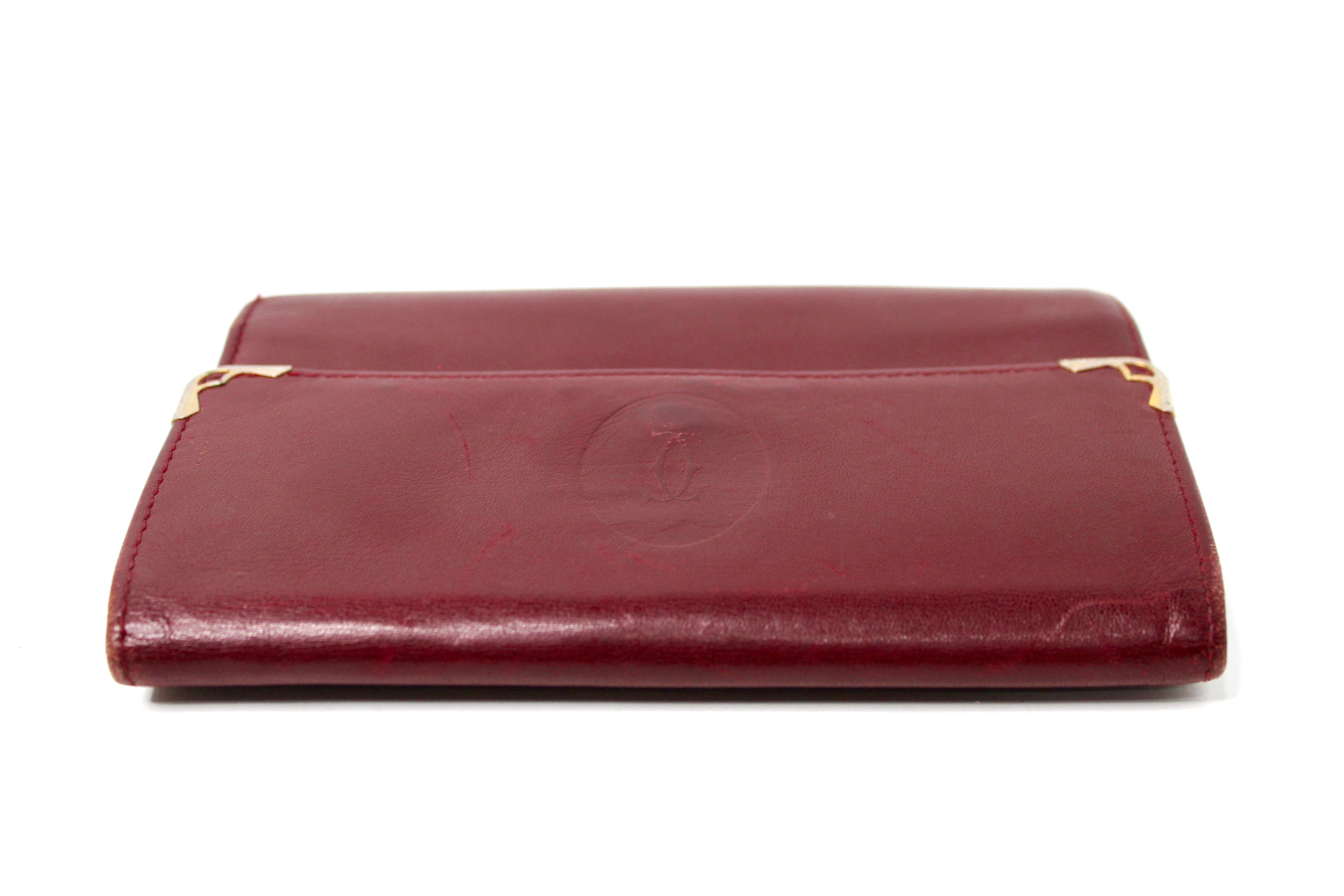 Portafoglio Trifold in pelle bordeaux Must de Cartier circa anni '80 in vendita 2
