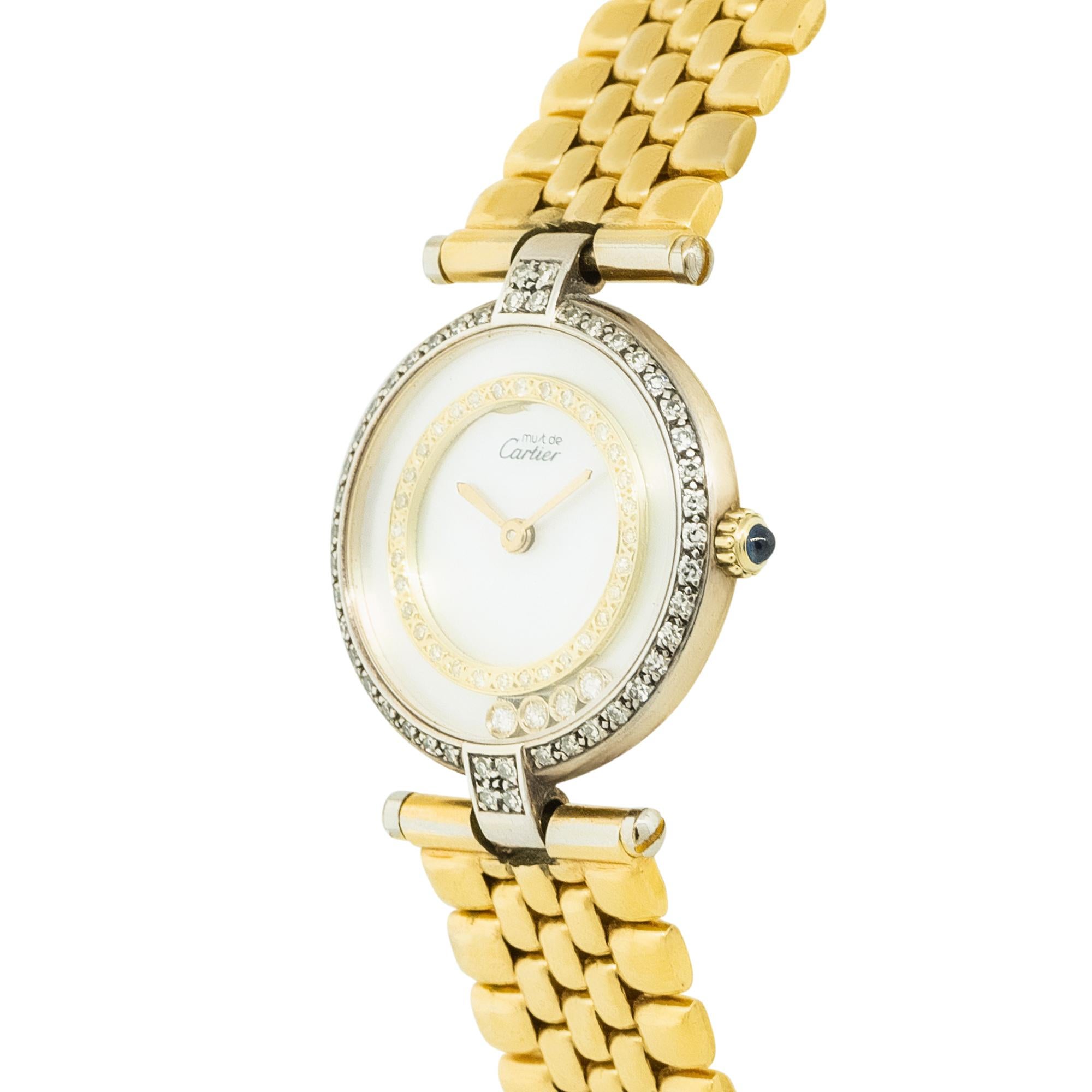 Brand: Cartier
Model: Must de Cartier
Case Material: Gold Plated Sterling Silver
Case Diameter: 24mm
Dial: Off-White Floating Diamond Dial
Bezel: Diamond Bezel
Bracelet: Gold Plated Sterling Silver
Movement: Quartz
Reference Number: WFCL0003
Size: