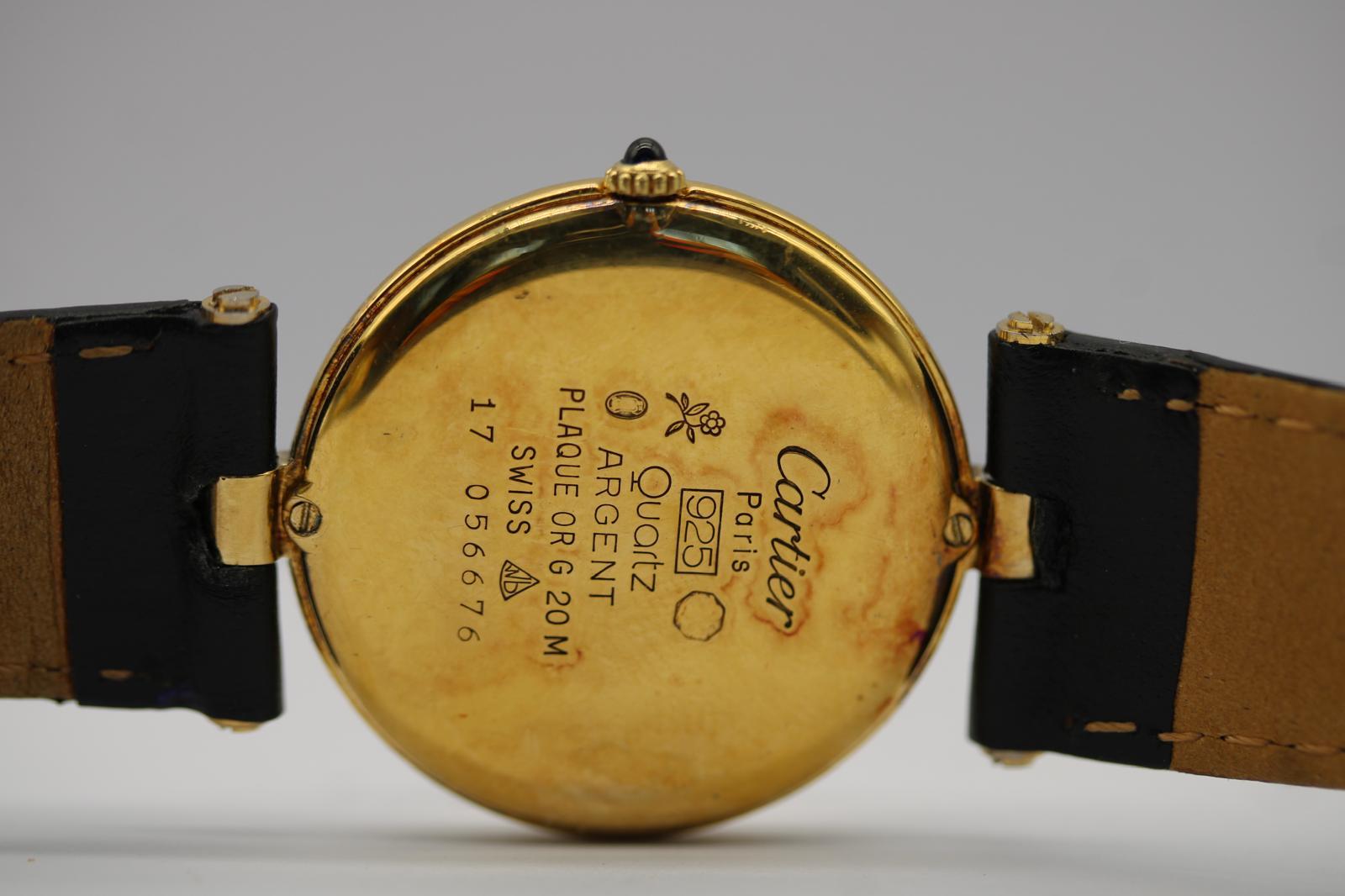 Cartier Must de Cartier Ronde Vendome Vermeil  Ref. 81  1990s  Black Roman Dial
A refined and elegant unisex timepiece, this Cartier Must de Cartier Ronde Vendome from the 1990s showcases the timeless design language that makes Cartier instantly