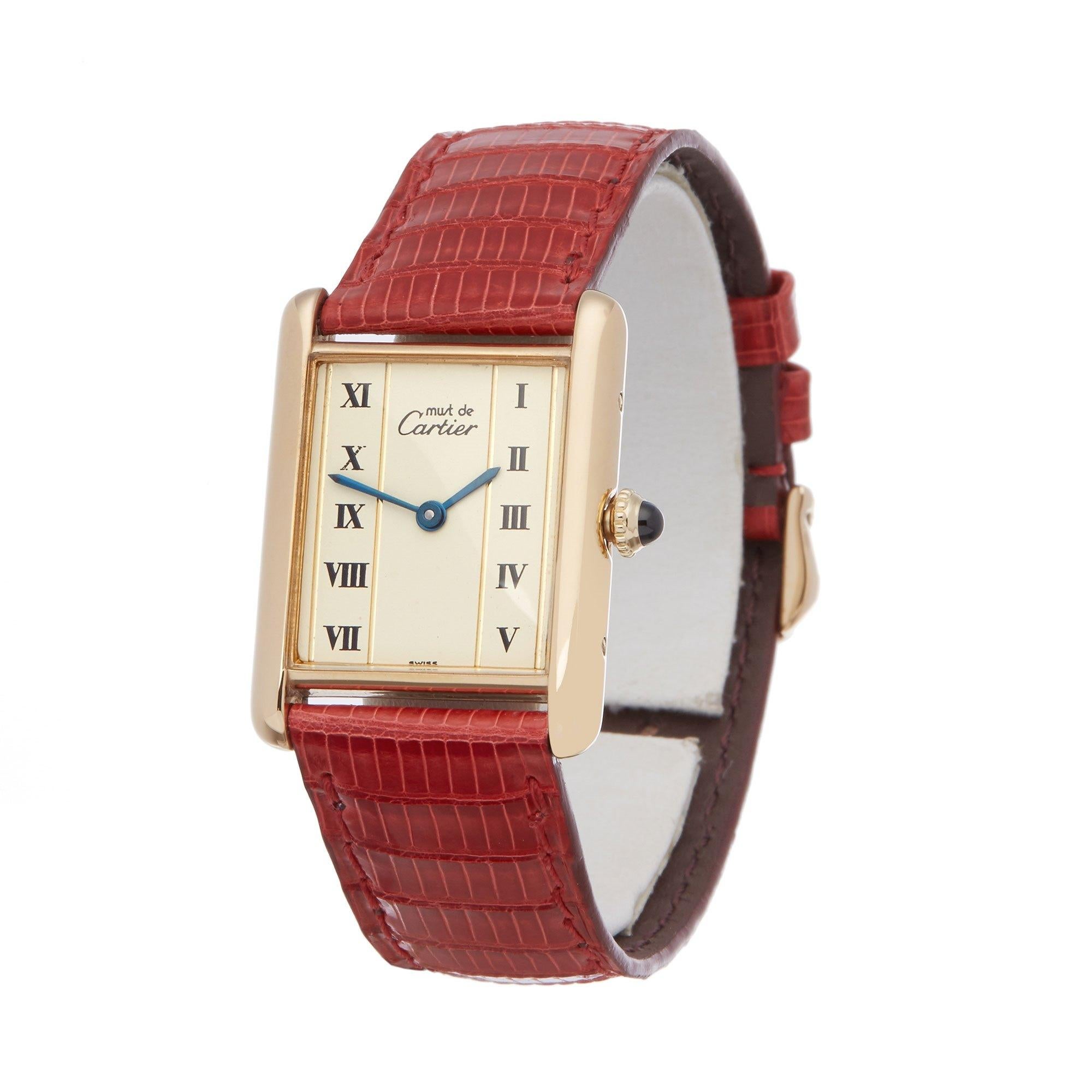 Xupes Reference: W007472
Manufacturer: Cartier
Model: Must de Cartier
Model Variant: Tank,
Model Number: 82102
Age: 1990
Gender: Ladies
Complete With: Cartier Service Pouch & Service Receipt 
Dial: White Roman
Glass: Sapphire Crystal
Case Size: 23mm