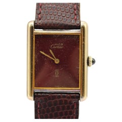 Serbatoio Must de Cartier  Quadrante borgogna  Carica manuale  Vermeil  1981