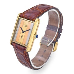 Montre homme mécanique Must de Cartier Tank Trinity Vermeil
