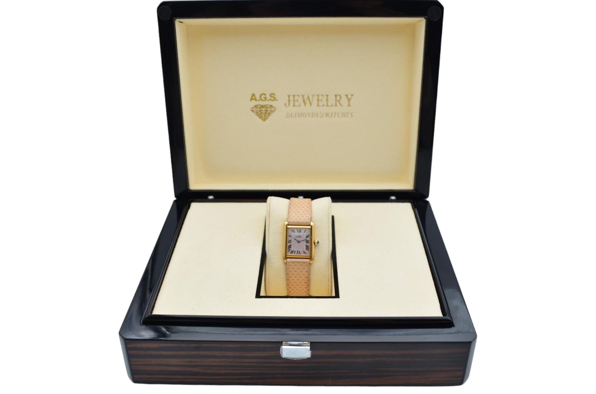 The watch is in a very good condition and it’s working well. The total length of the bracelet (case+bracelet) is 16.5cm. It shows slight signs of wear and scratches. The leather strap is worn out. The watch comes with an AGS Jewelry wooden box,