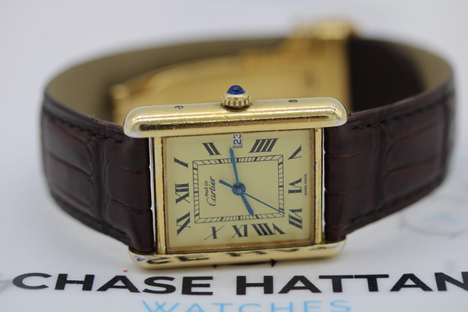 Must de Cartier Vermeil Ref. 2413  Large Model  Date  Lemon Dial  Box & Papers

The Must de Cartier line can be found in many variations, but this particular configuration — the large Ref. 2413 with date function — is far rarer and highly