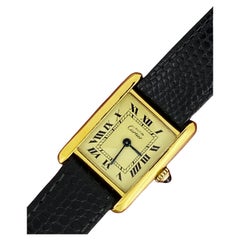 Orologio vintage Must de Cartier Vermeil Tank Quartz, 21 mm x 28 mm.