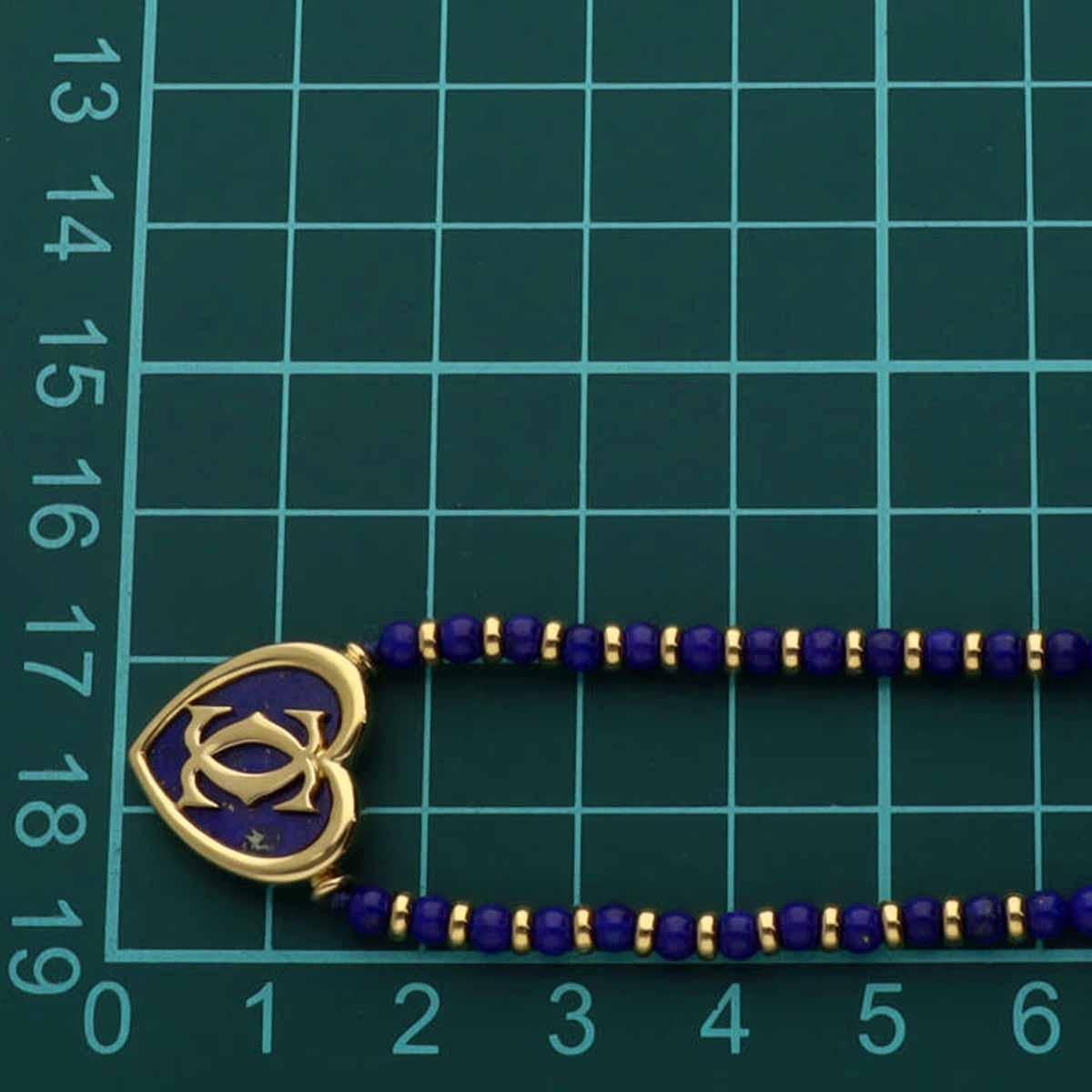 Cartier DEVE avere un cuore con doppia C in lapislazzuli in oro giallo 18 carati. in vendita 1