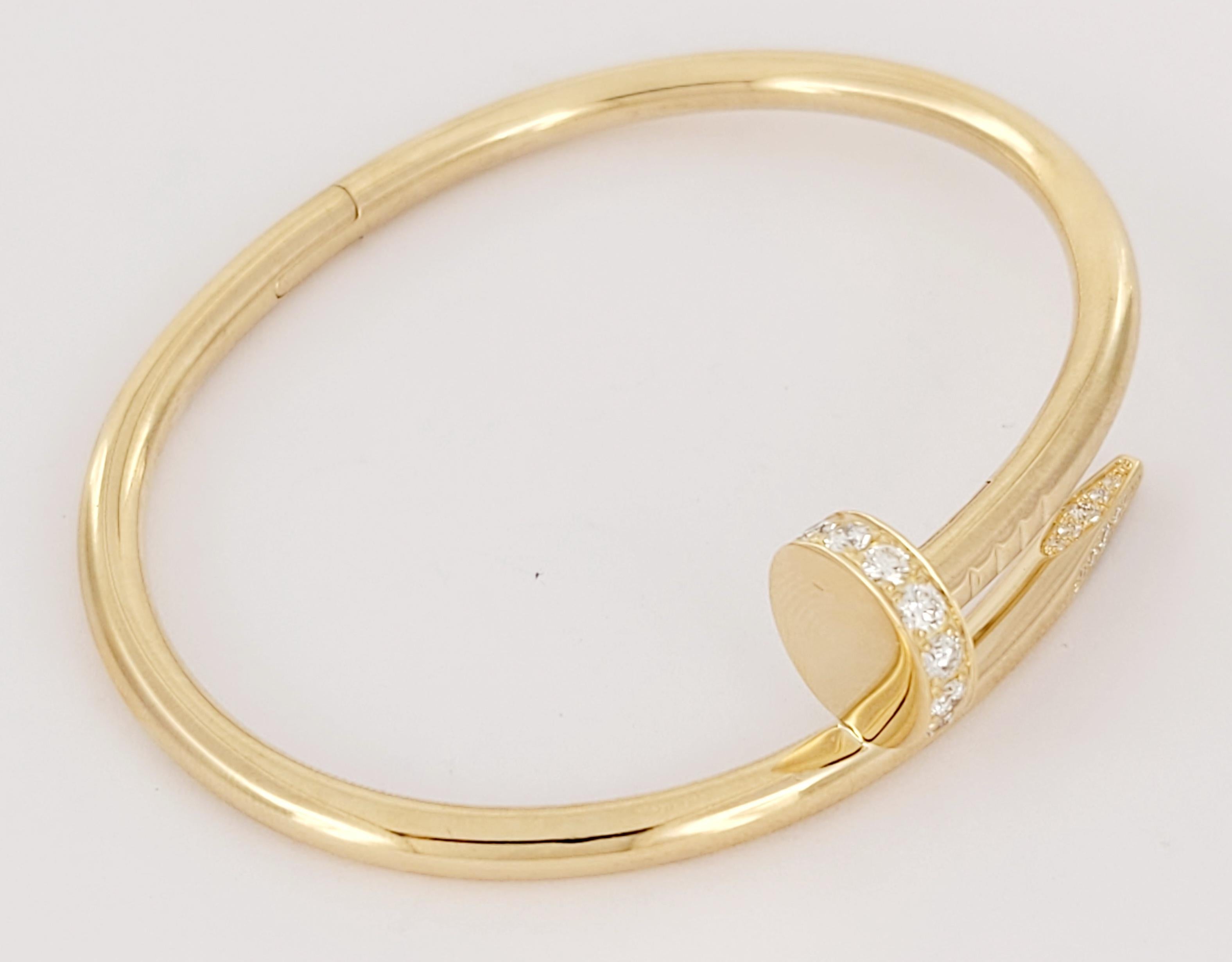 Brand Cartier  
Style Nail 
Material 18K Yellow Gold with Diamonds 
Brilliant cut Diamonds totaling 0.58ct
Diamond estimated quality: EF/VS
Bracelet Size 15
Bracelet Weight 28.8gr
Bracelet width 3.5mm 
Mint Condition Like, new
Comes with Cartier