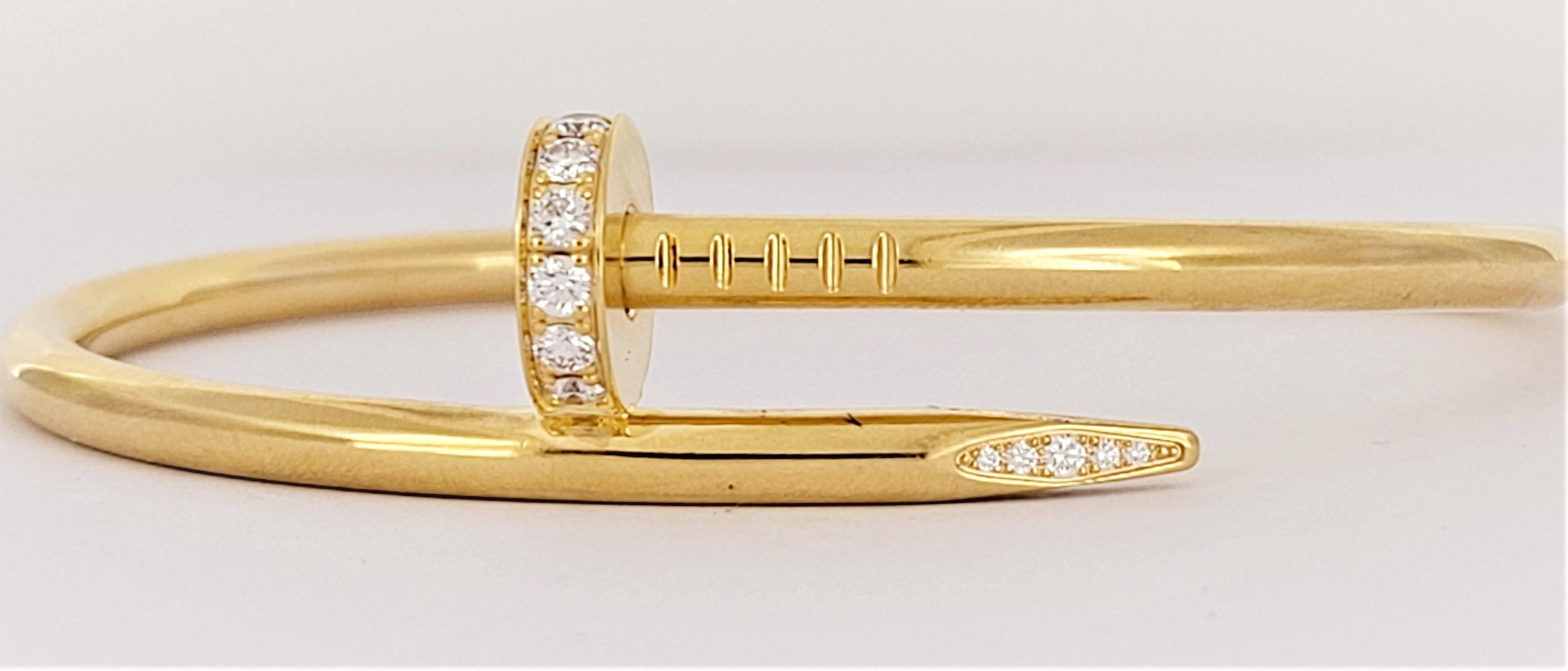 Brand Cartier  
Style Nail 
Material 18K Yellow Gold with Diamonds 
Brilliant cut Diamonds totaling 0.58ct
Diamond estimated quality: EF/VS
Bracelet Size 17
Bracelet Weight 31.5gr
Bracelet width 3.5mm 
Mint Condition Like, new
Comes with Cartier