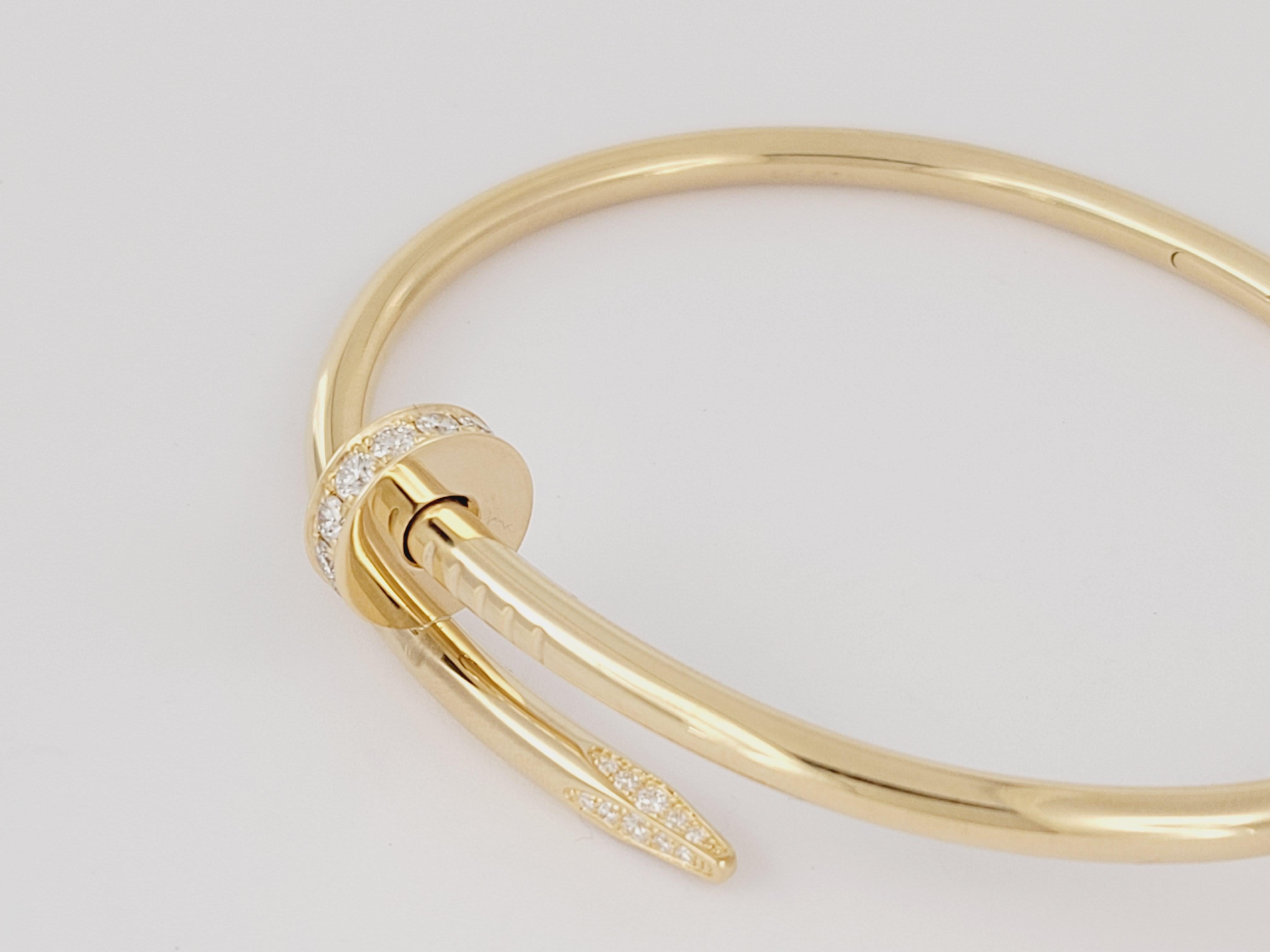 Marque Cartier  
Clou de style 
MATERIAL Or jaune 18K avec diamants 
Diamants de taille brillant totalisant 0,58ct
Qualité estimée du diamant : EF/VS
Bracelet Taille 18
Poids du bracelet 33gr
Largeur du bracelet 3,5 mm 
Mint Condition Comme,