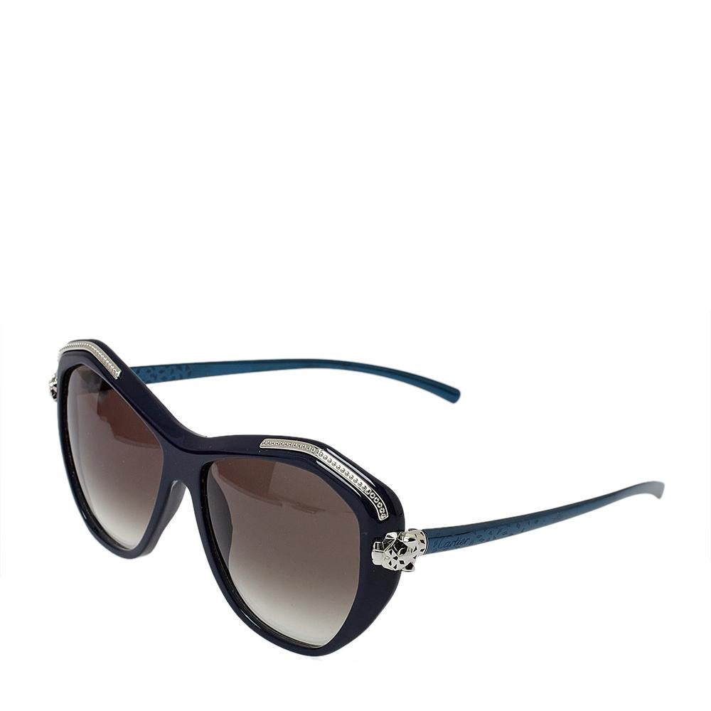 This classic and timeless pair from the fashion house of Cartier will hold a special and forever place in your collection. Constructed in a blue-tone frame and arms, this Panthere Wild De Cartier pair features a Panther detail on the side while the