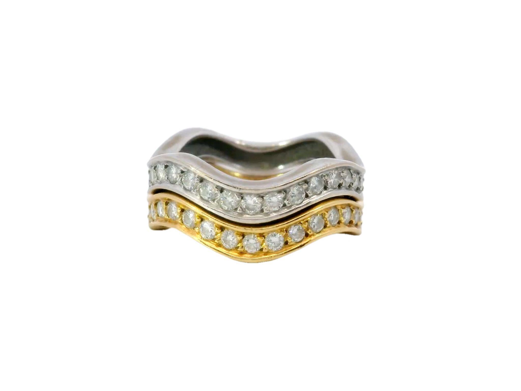 Cartier Neptune Stackable Wave Ring in 18 Karat Yellow and White Gold 

This Cartier ring is a beautiful mix of shapes, colors, and radiance. It has a special design that looks like gentle waves flowing together, and in those waves are 1.4 carats of