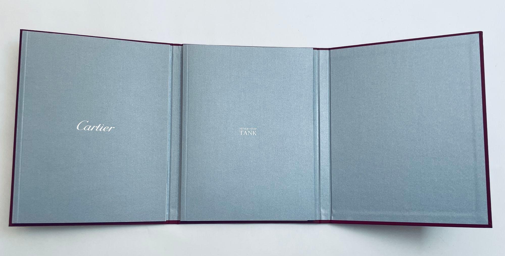 Cartier Never Stop Tank Wat Collection 2012 Hardcover Catalog, Brochure Portfolio.
Hard Cover, text in English with price list.
Beautiful small catalog showing celebrities wearing the Iconic Tank watch from 1920s to the 2012.
Collectible limited