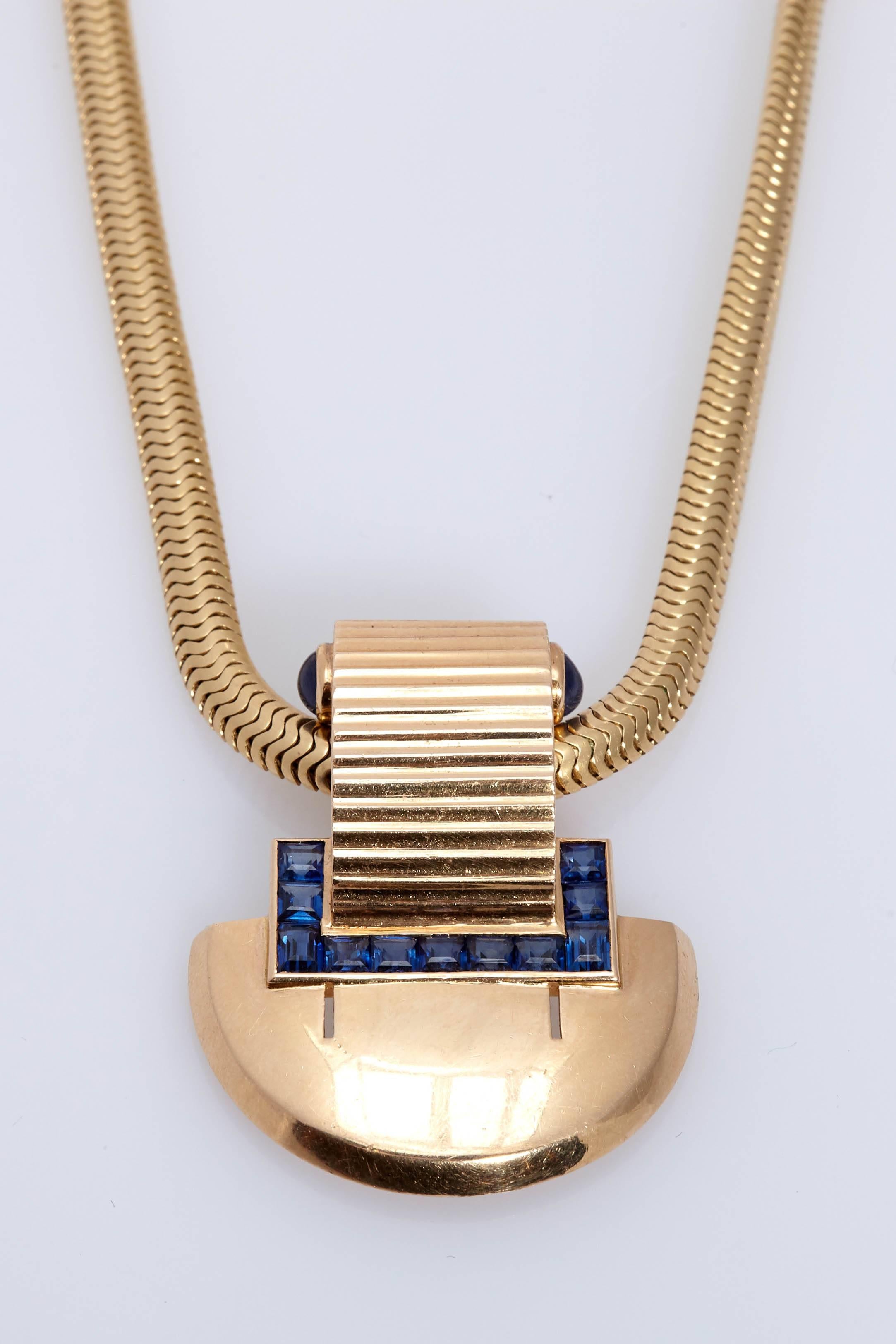 A Cartier retro 14kt gold and sapphire necklace with detachable brooch. Made in New York, circa 1950