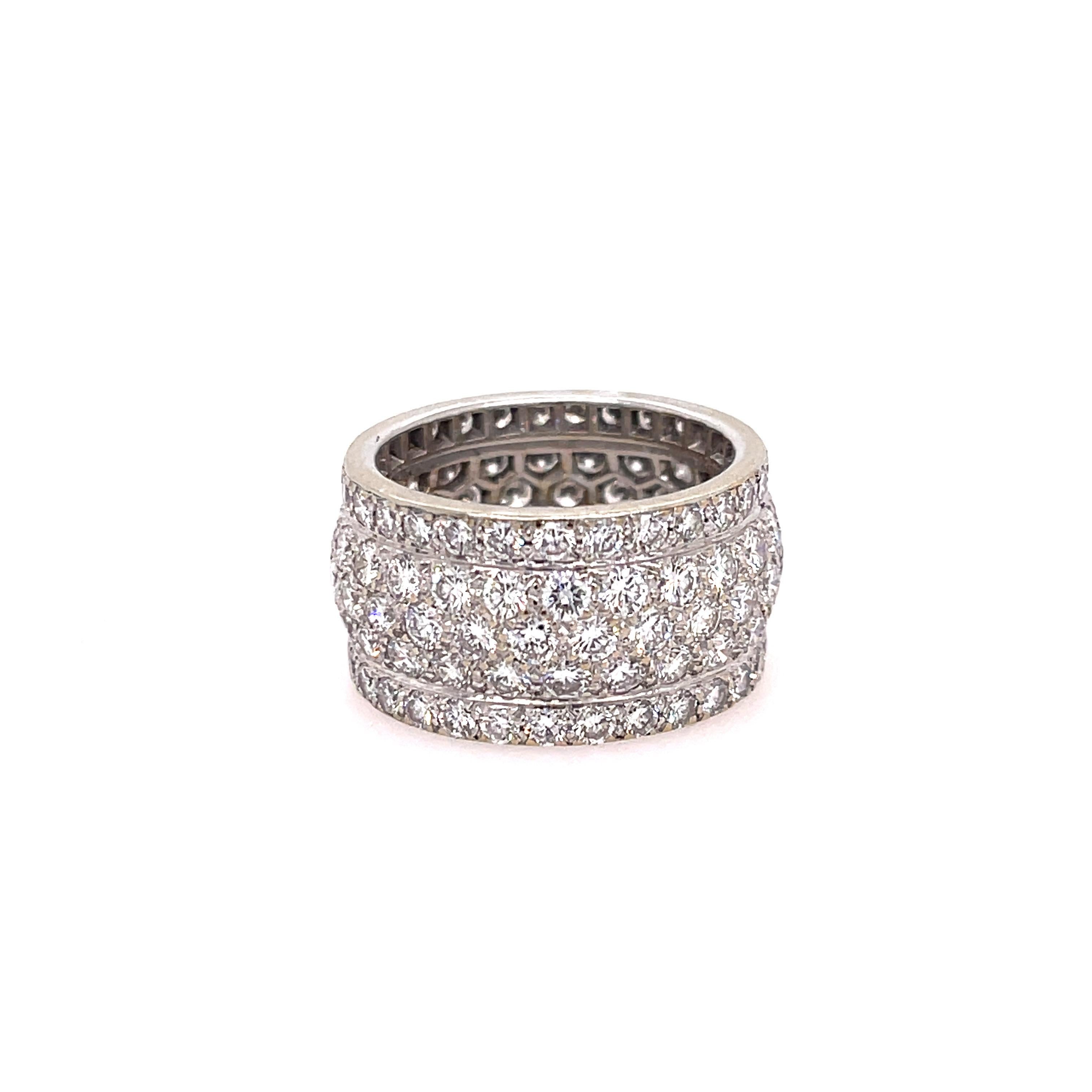 Estate Cartier Nigeria Diamond Band 18K White Gold. The ring features approximately  5.50ctw of brilliant round cut diamonds (F-G color, VVS-VS1 clarity). Stamped with French hallmarks and Cartier 750. Finger size 7.5, ring cannot be sized.