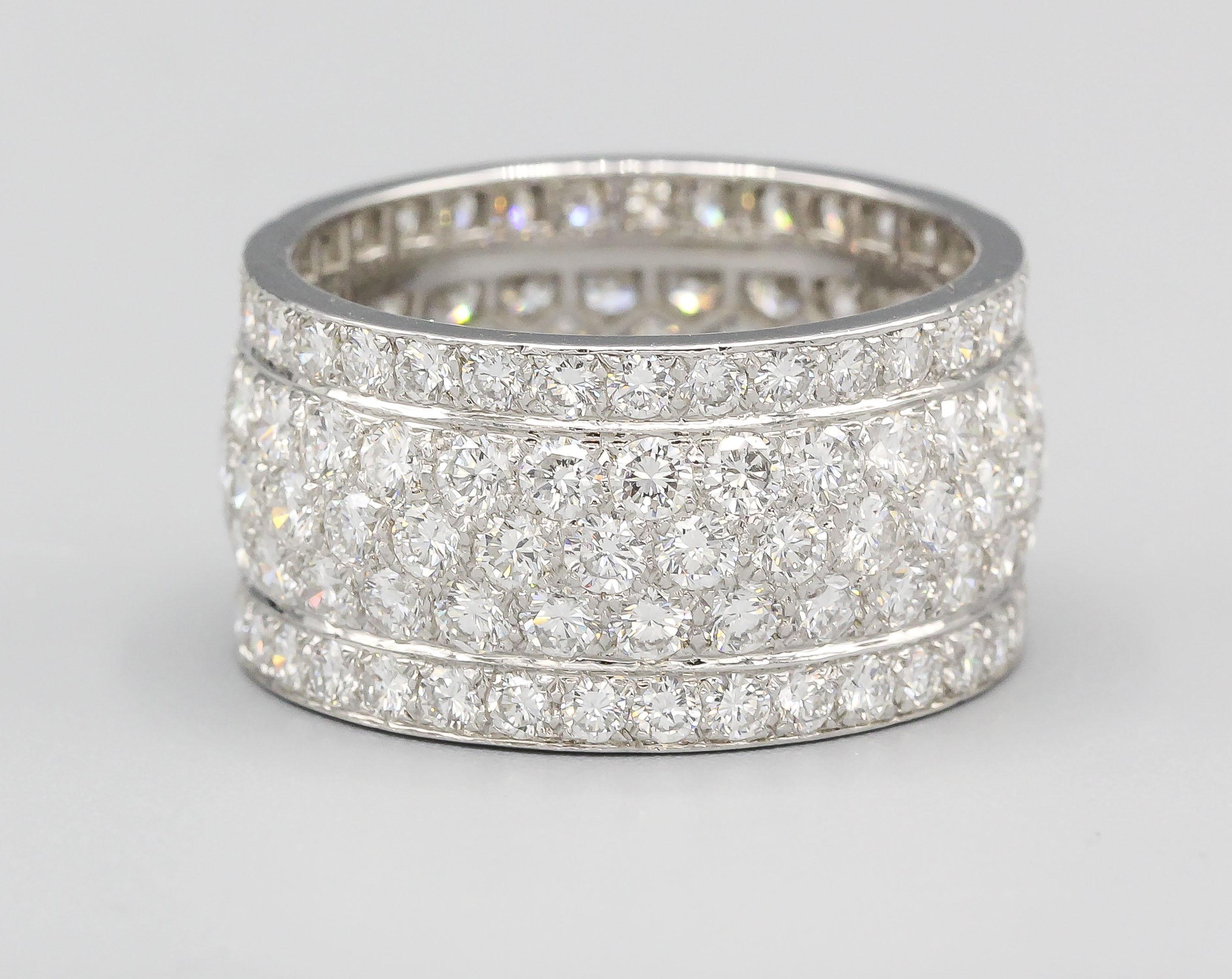 Indulge in the epitome of opulence with this fine Cartier 5-row diamond 18 Karat white gold band. This exquisite piece is a tribute to Cartier's commitment to craftsmanship, luxury, and cultural influence.  Crafted in the finest 18 karat white gold,