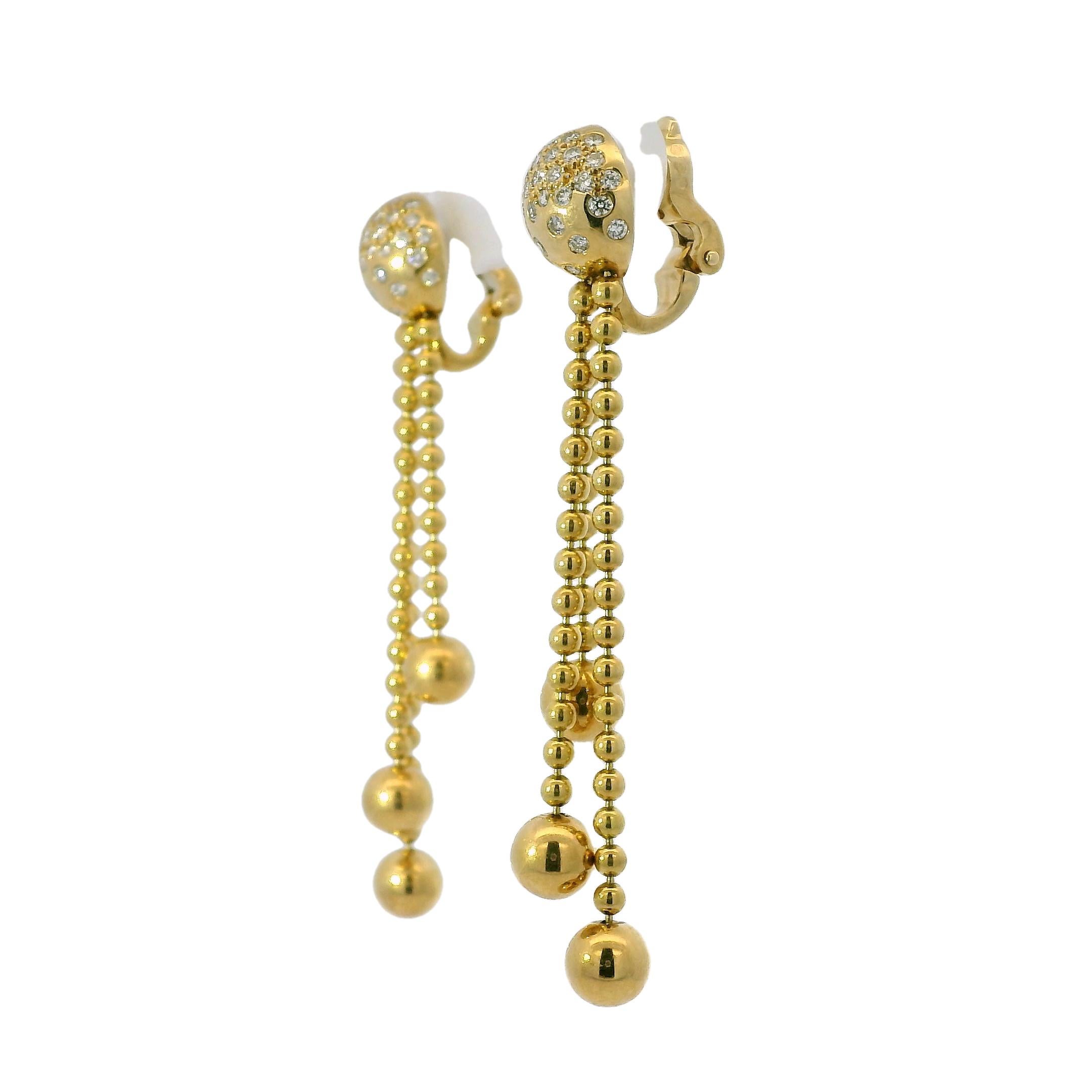 Cartier Nouvelle Vague Draperie Diamond 18-Karat Drop Earrings 

These exquisite Cartier diamond drop earrings perfectly blend timeless elegance and modern style. Crafted from 18k yellow gold, they feature a sleek and sophisticated design that is