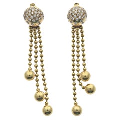 Cartier Boucles d'oreilles Nouvelle Vague Draperie en or et diamants