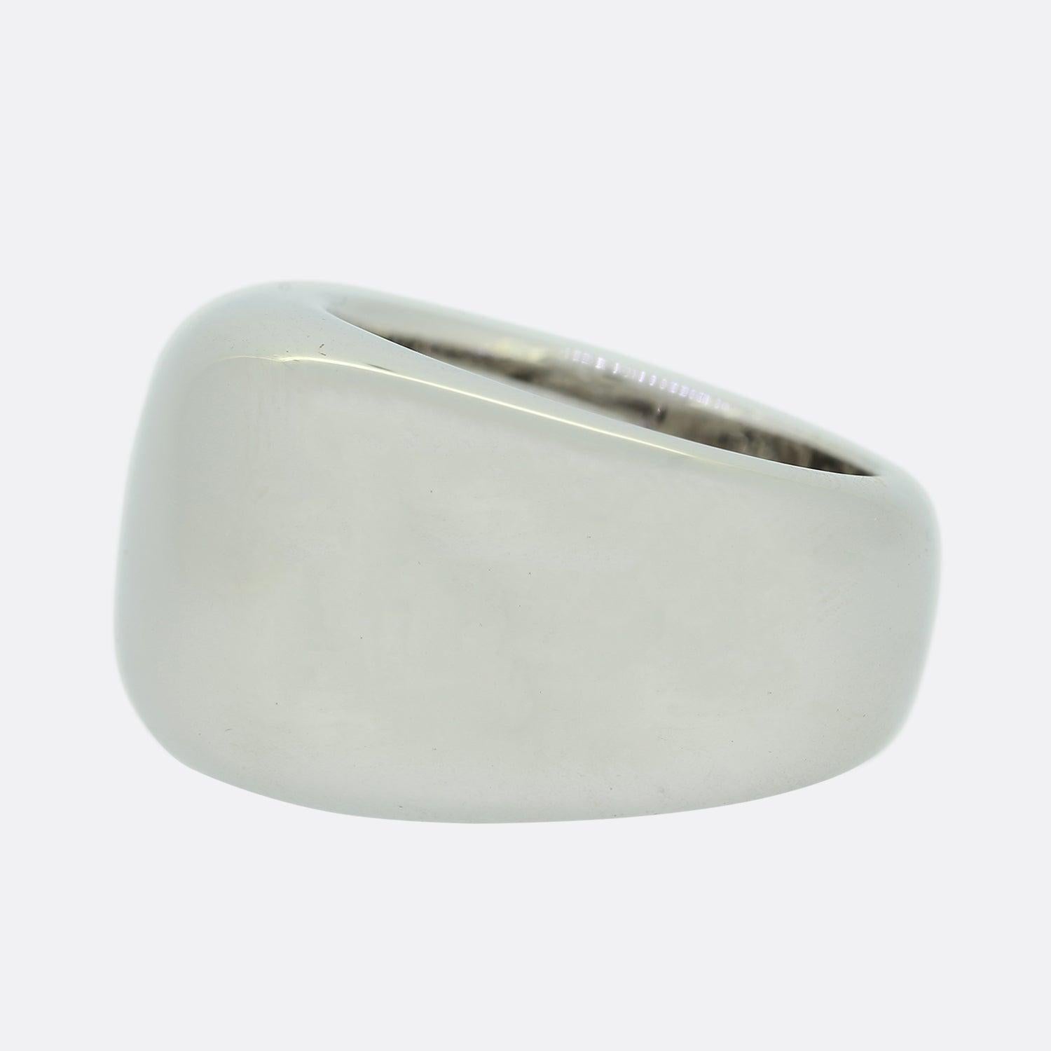 This is a beautiful ring from the luxury jewellery designer Cartier. The ring forms part of the 'Nouvelle Vague' collection and is an impressive 14.2 grams of 18ct white gold.

Condition: Used (Very Good)
Weight: 14.2 grams
Ring Size: J (49)
Band
