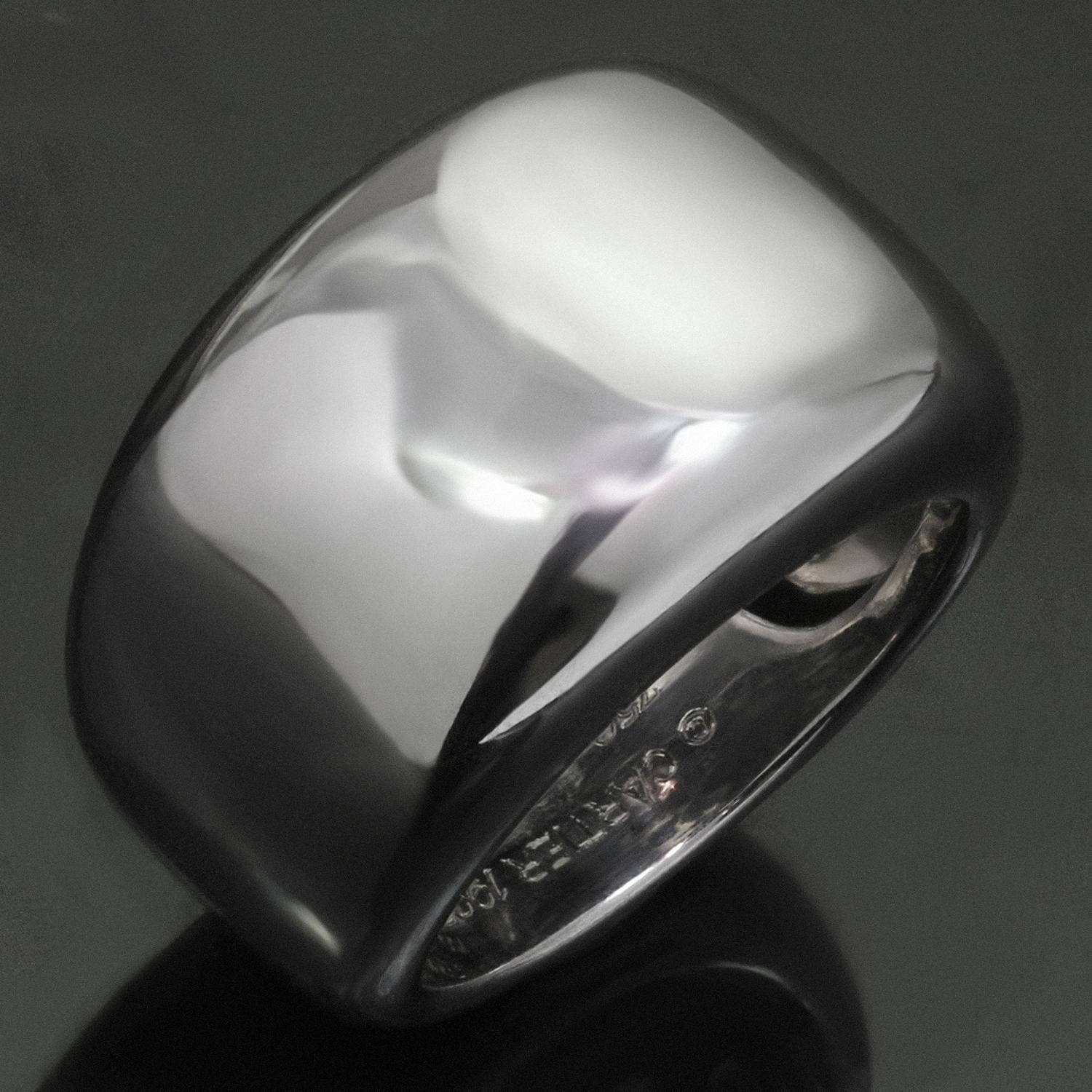 This classic Cartier ring from the Nouvelle Vague collection features a wide band design crafted in 18k white gold. Made in France circa 1997. Measurements: 0.55