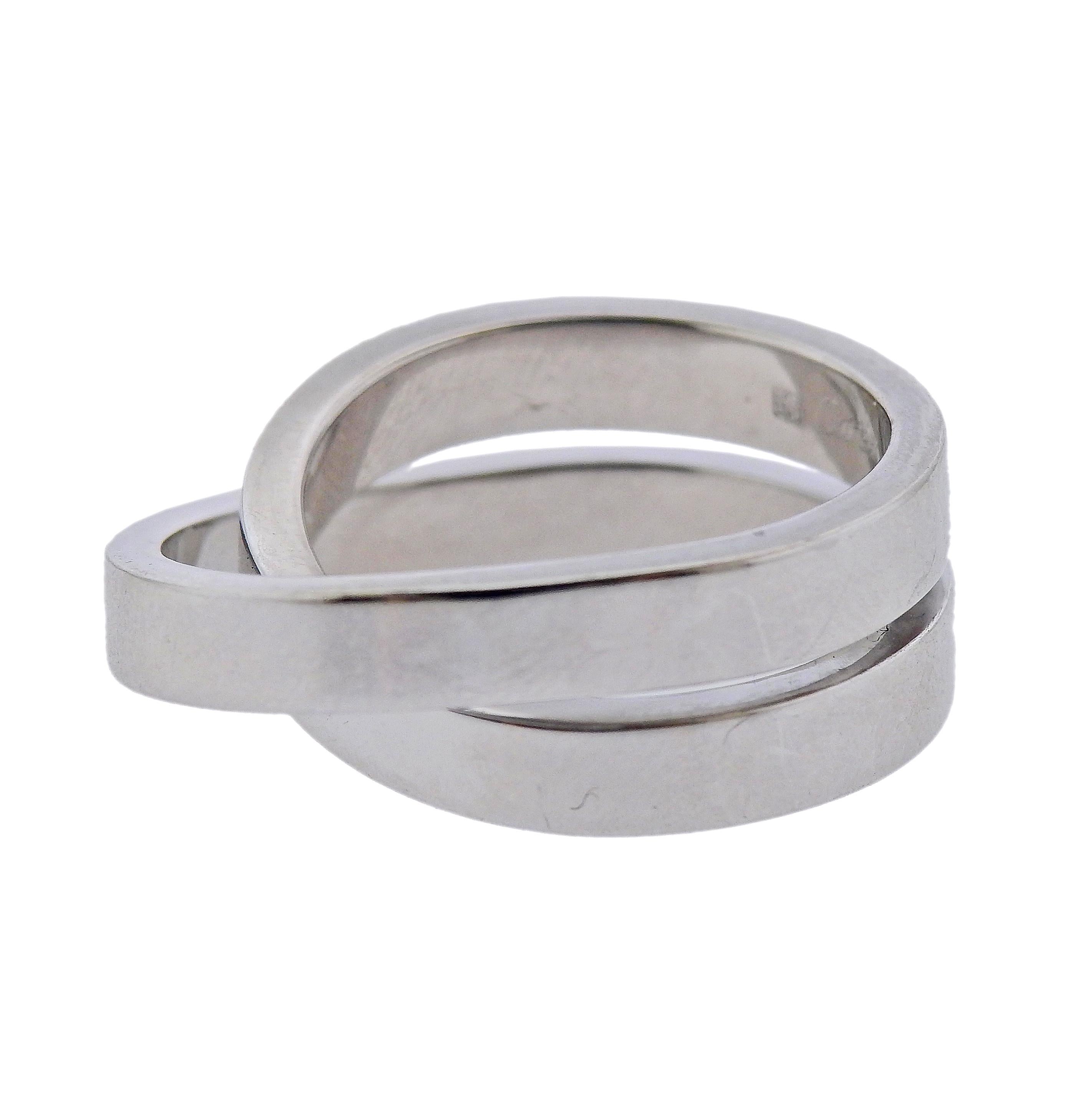 18k white gold Cartier Nouvelle Vague ring. Size 7.5, ring top is 9mm wide. Marked: Cartier, 1999, 750, H 90244. Weight - 16.1 grams. 